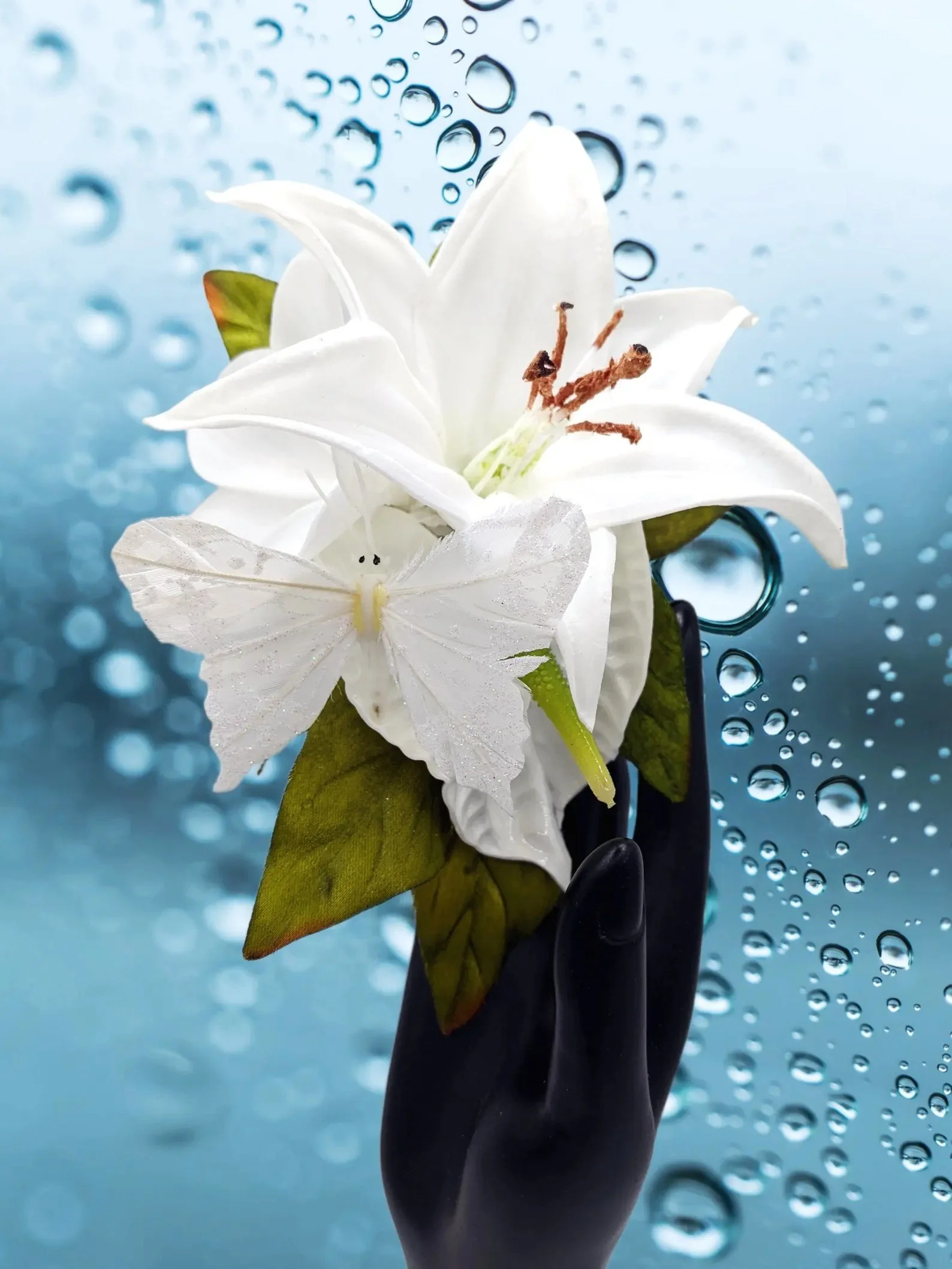 wedding headpiece with white butterfly, lily and anthurium