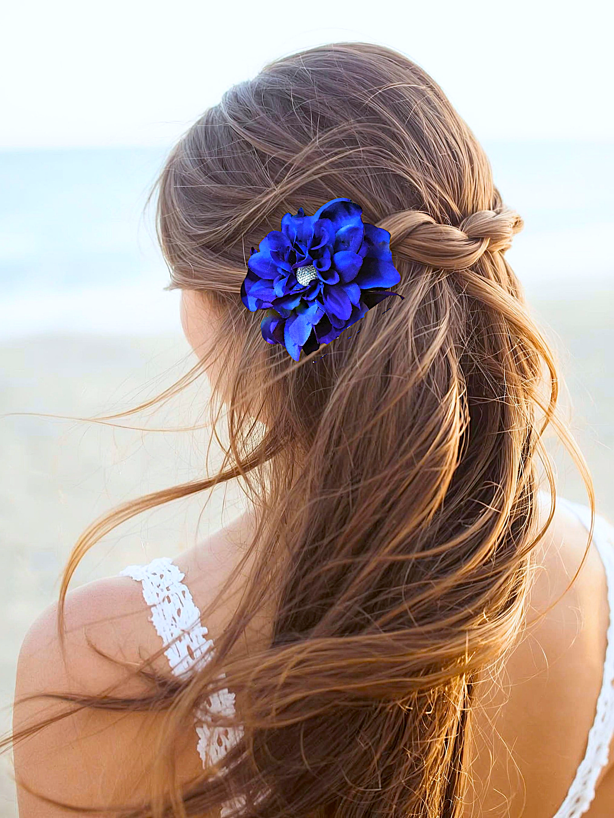 Bride wearing Royal Blue Silk Dahlia flower clip
