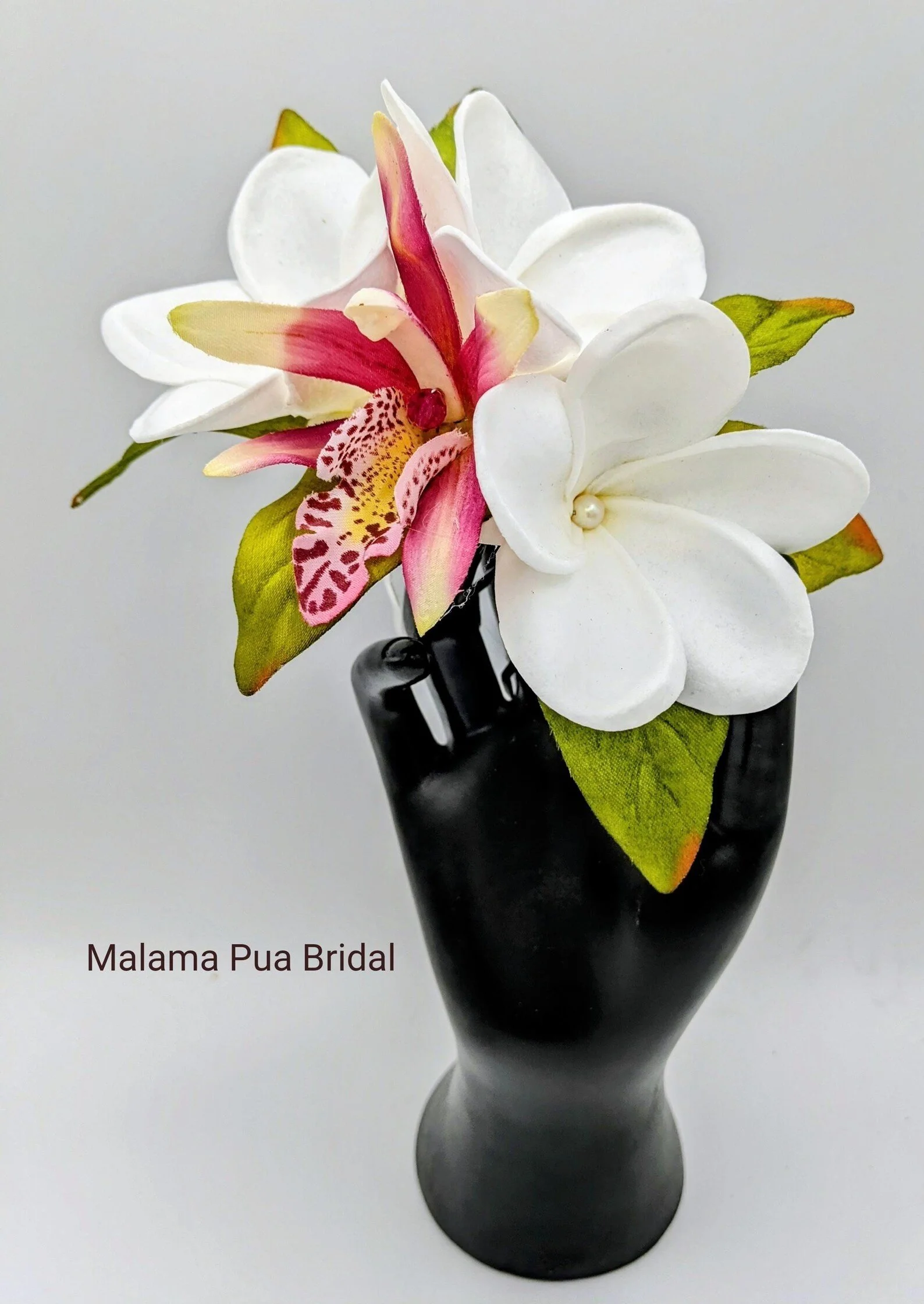white plumeria and silk pink orchid and crystal bridal headpiece