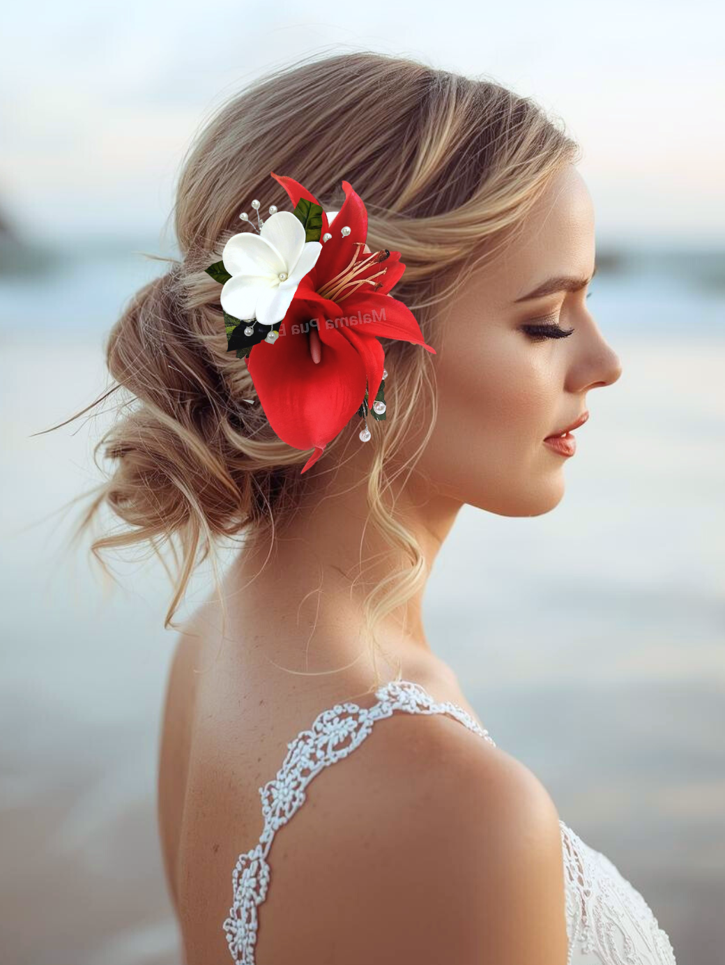 bride wearing headpiece with silk red calla lily and plumeria pearls