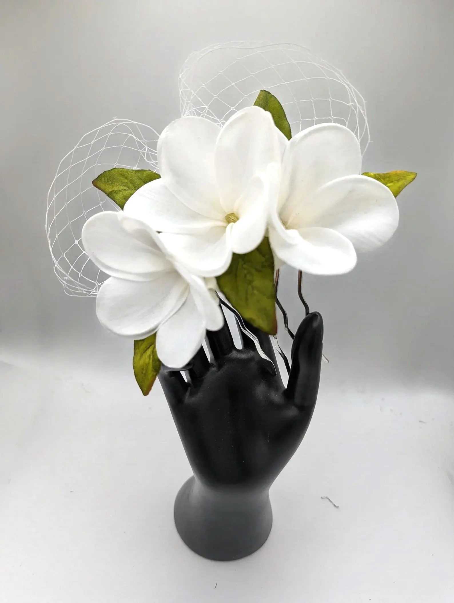 Tropical wedding headpiece with Hawaiian plumeria silk flowers