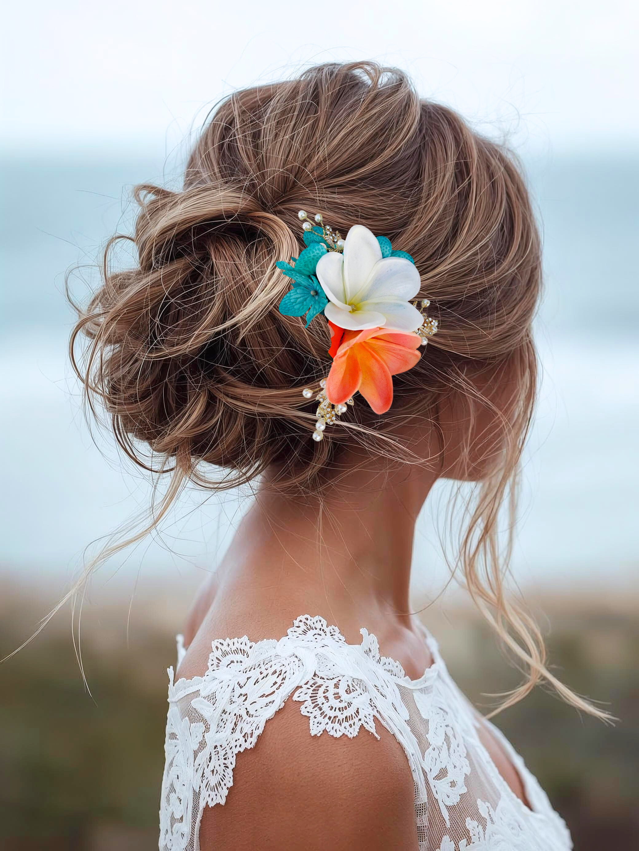 bridal wearing sunset and white plumeria tropical headpiece