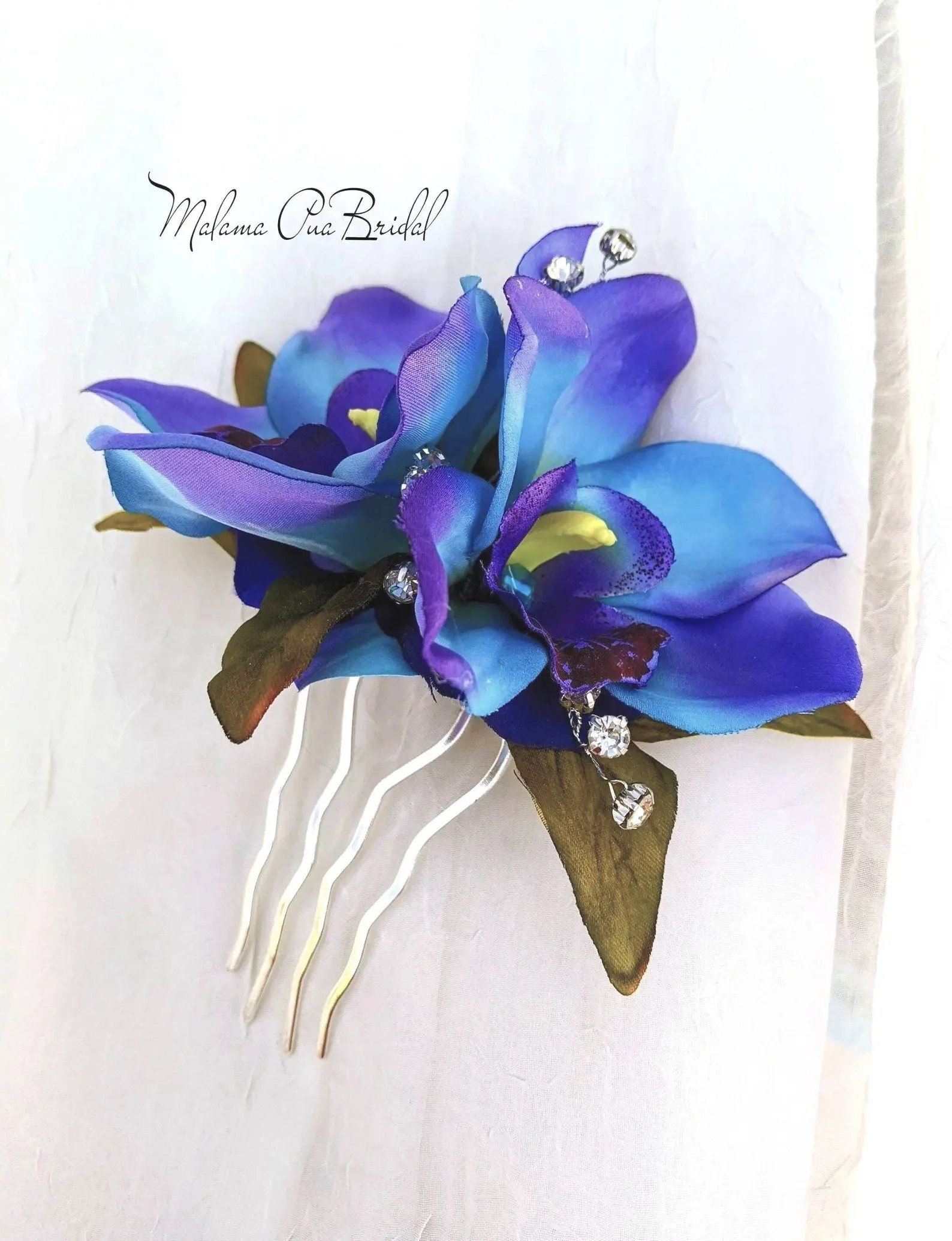 wedding headpiece with blue orchids and rhinestones
