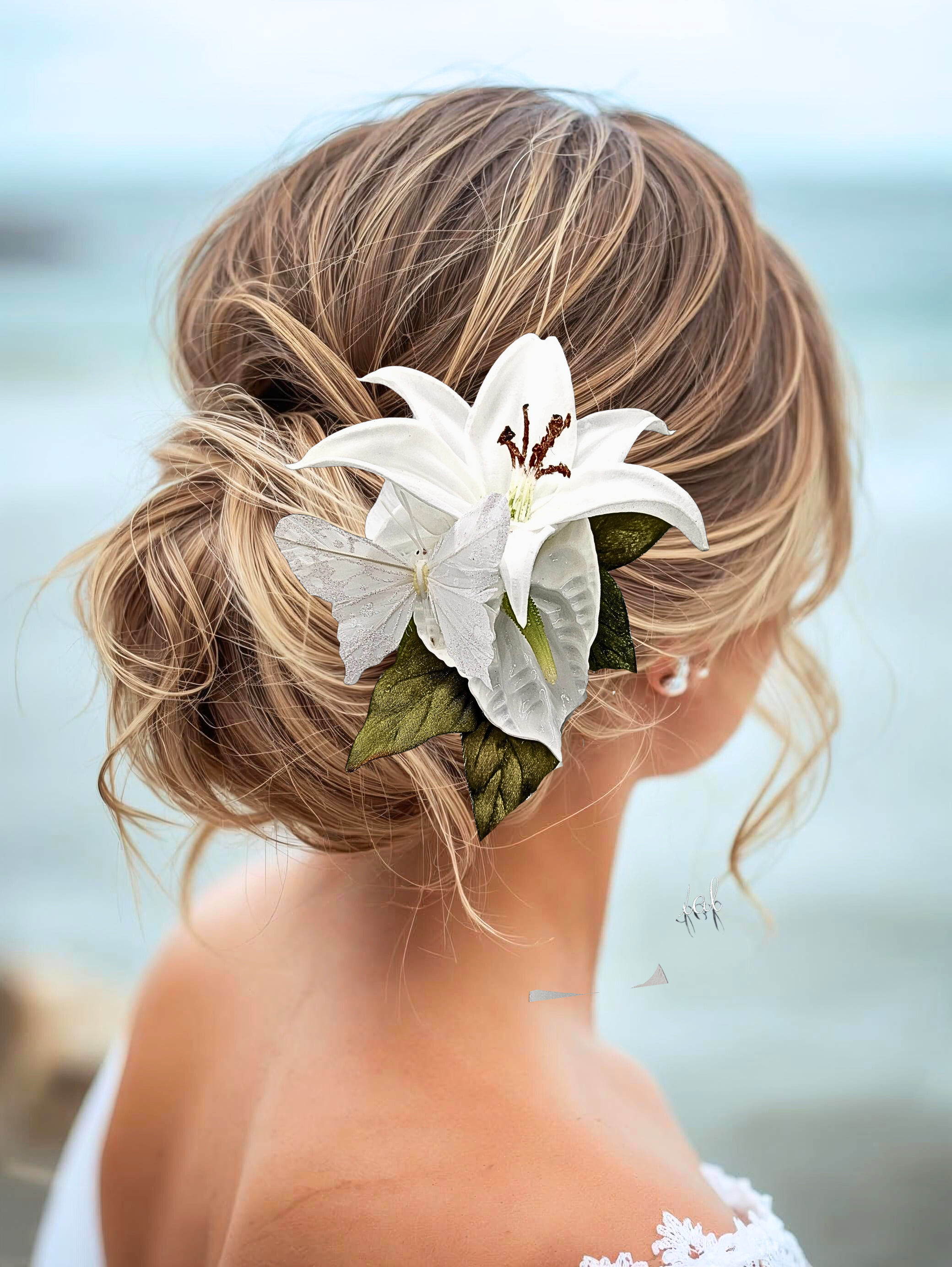 wedding headpiece with white butterfly, lily and anthurium