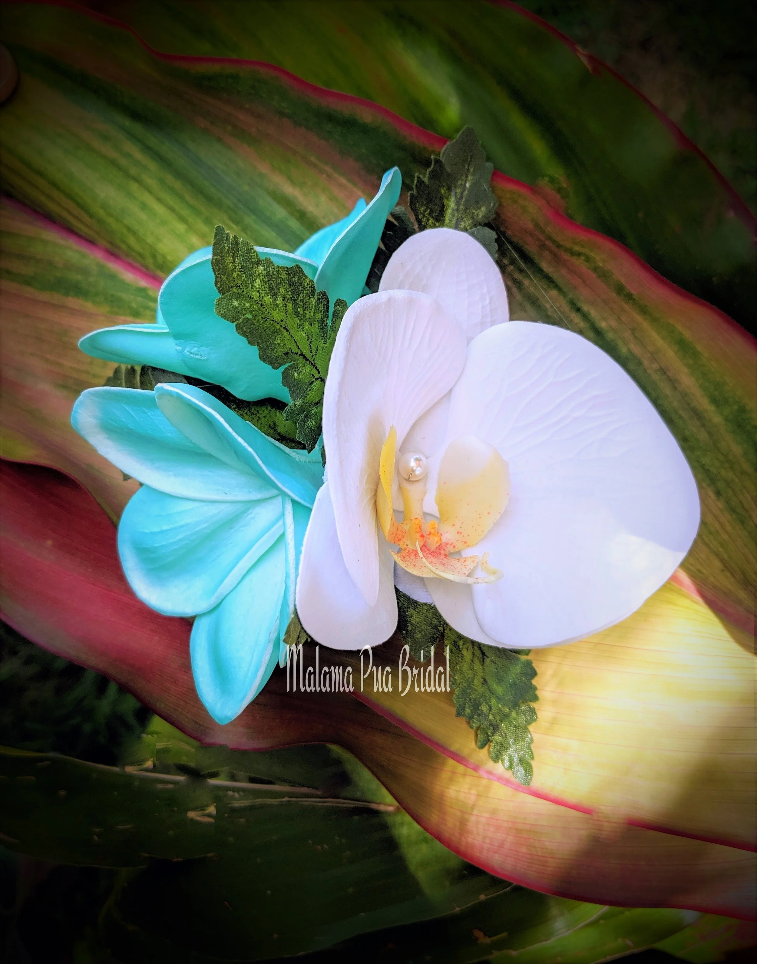 Tropical wedding headpiece with orchids