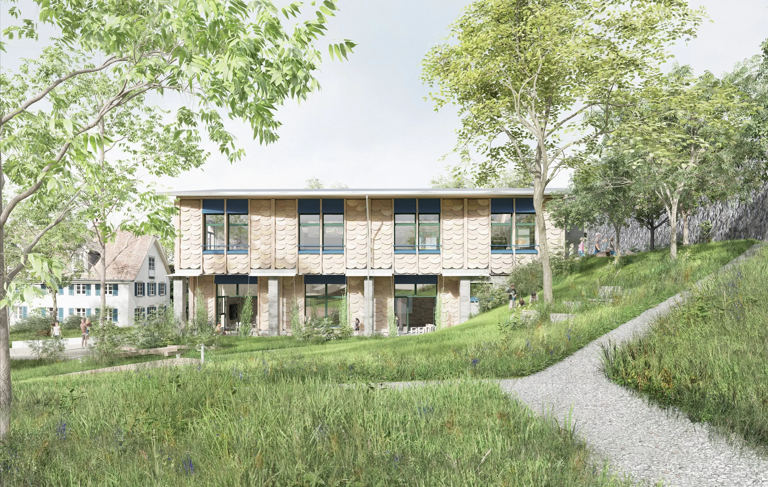 Spielwiese und zweigeschossiger Neubau