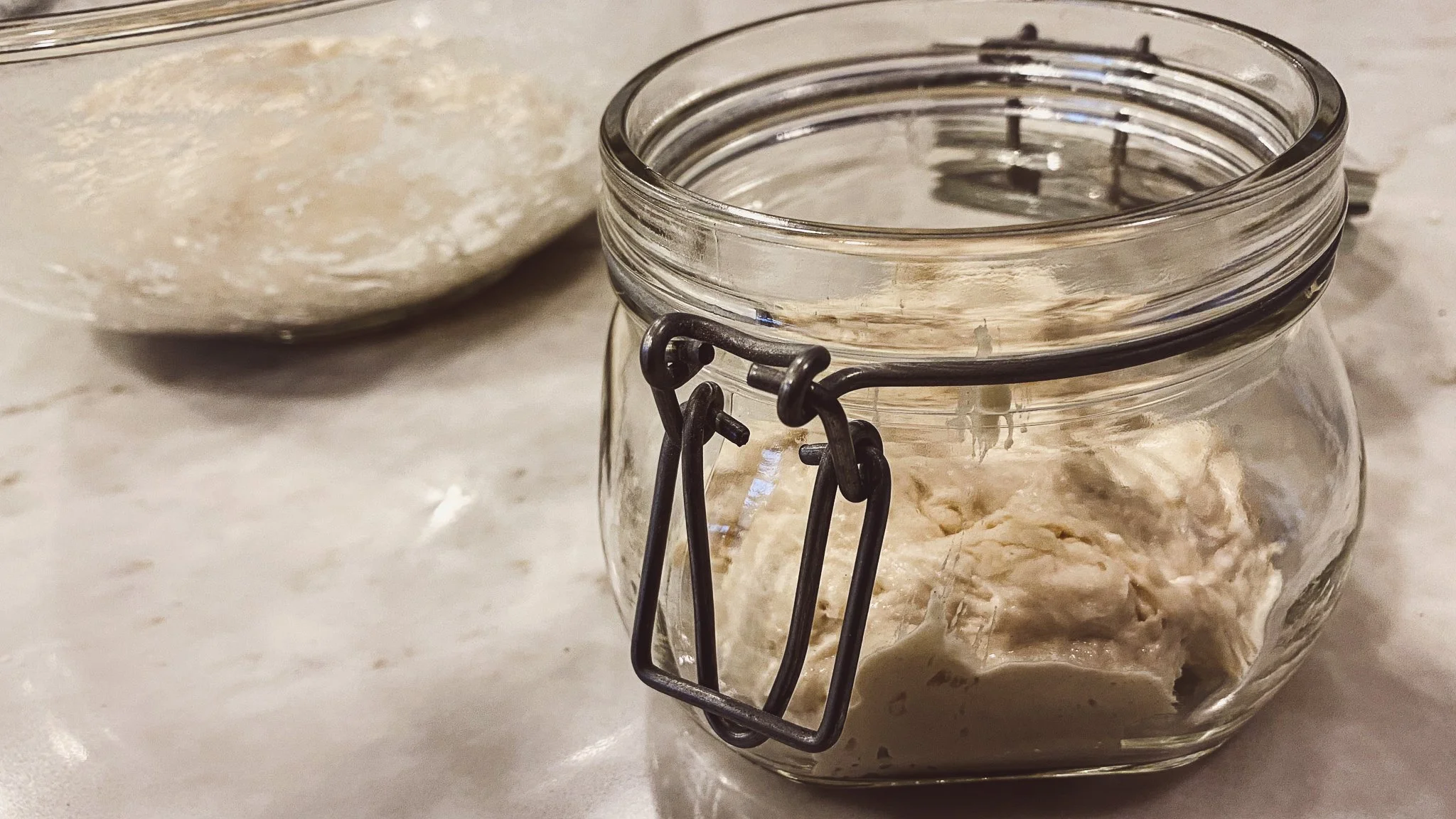 Sourdough starter in a jar.