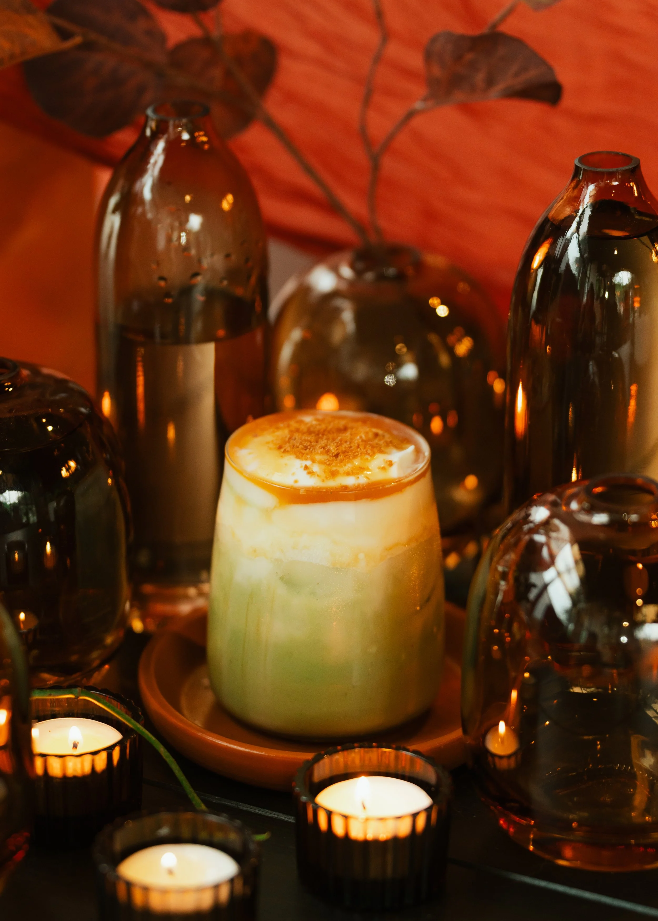 A matcha made with homemade honey crisp apple syrup, your choice of milk, topped with caramel cold foam and caramel drizzle 