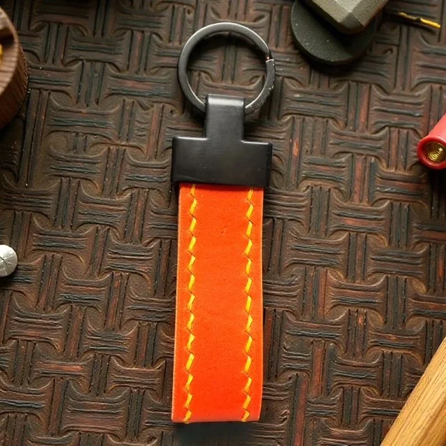 Handcrafted leather key loop for holding multiple keys securely, with simple and sleek design.