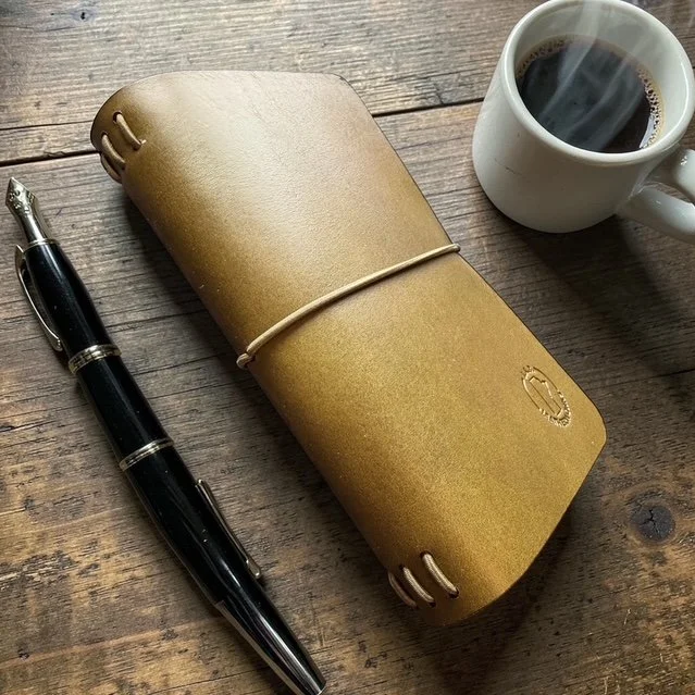Custom full grain leather traveler’s notebook cover trifold handmade journal cover. Manitoba, Canada