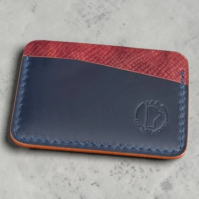 No. 46 navy & burgundy two-tone shell cordovan card holder by J.A.B. Leatherworks.