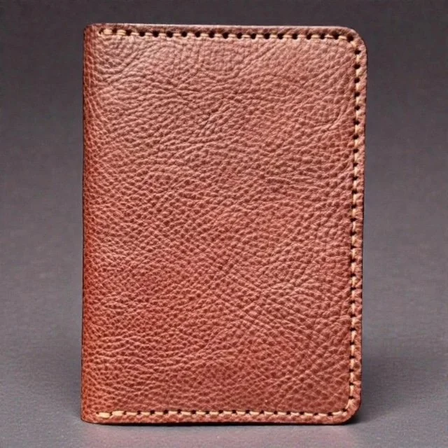 Premium leather passport wallet with multiple pockets for passport, cards, and travel documents.