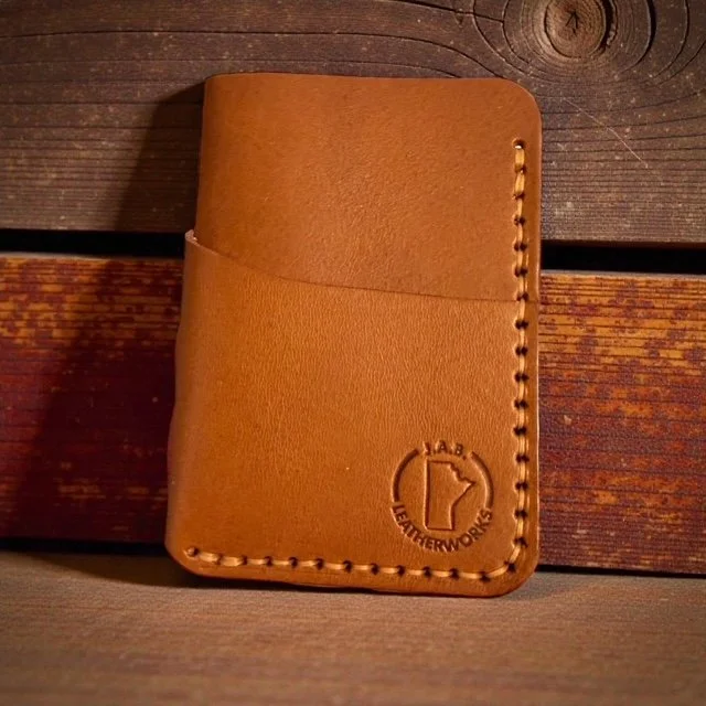 Handcrafted custom vegetable tanned premium full grain leather vertical card holder. Manitoba, Canada