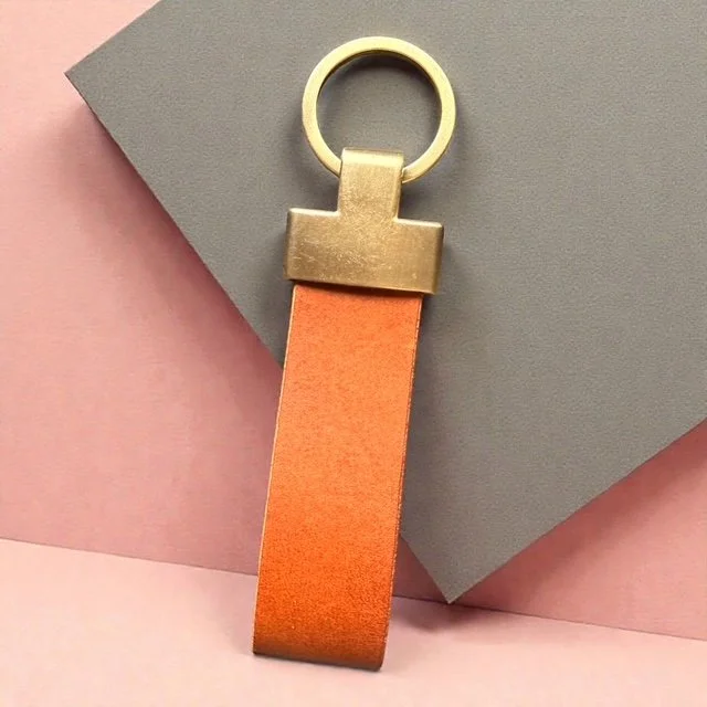 Handcrafted leather key loop for holding multiple keys securely, with simple and sleek design.