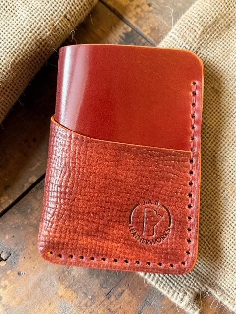 two-texture Rocado shell cordovan vertical three-pocket card holder in warm cognac with smooth upper and crosshatch-textured lower panels, handcrafted by J.A.B. Leatherworks, Canada.