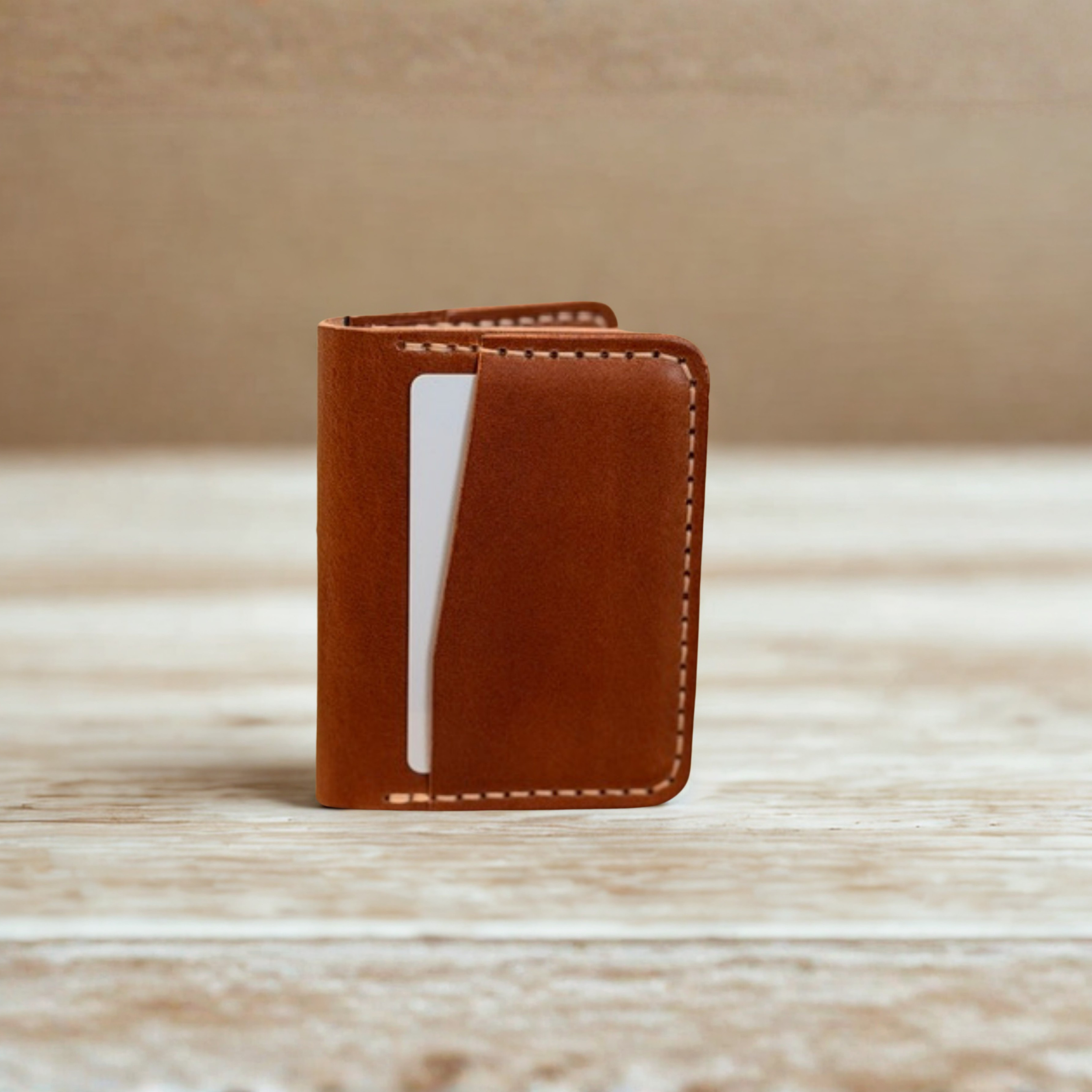 Premium full-grain leather bifold wallet with multiple card slots and cash compartment, handcrafted for durability