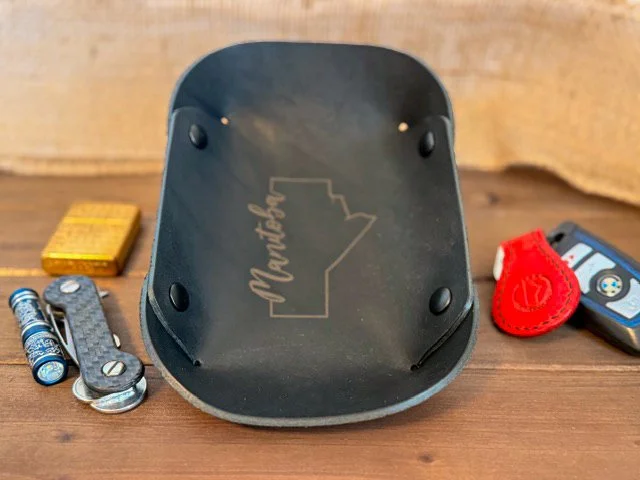 Handcrafted leather valet tray with stitched edges, perfect for holding keys, coins, and everyday essentials.