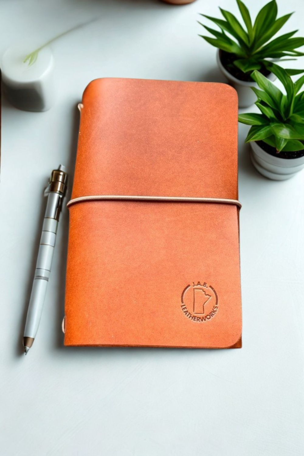Custom full grain leather traveler’s notebook cover trifold handmade journal cover. Manitoba, Canada