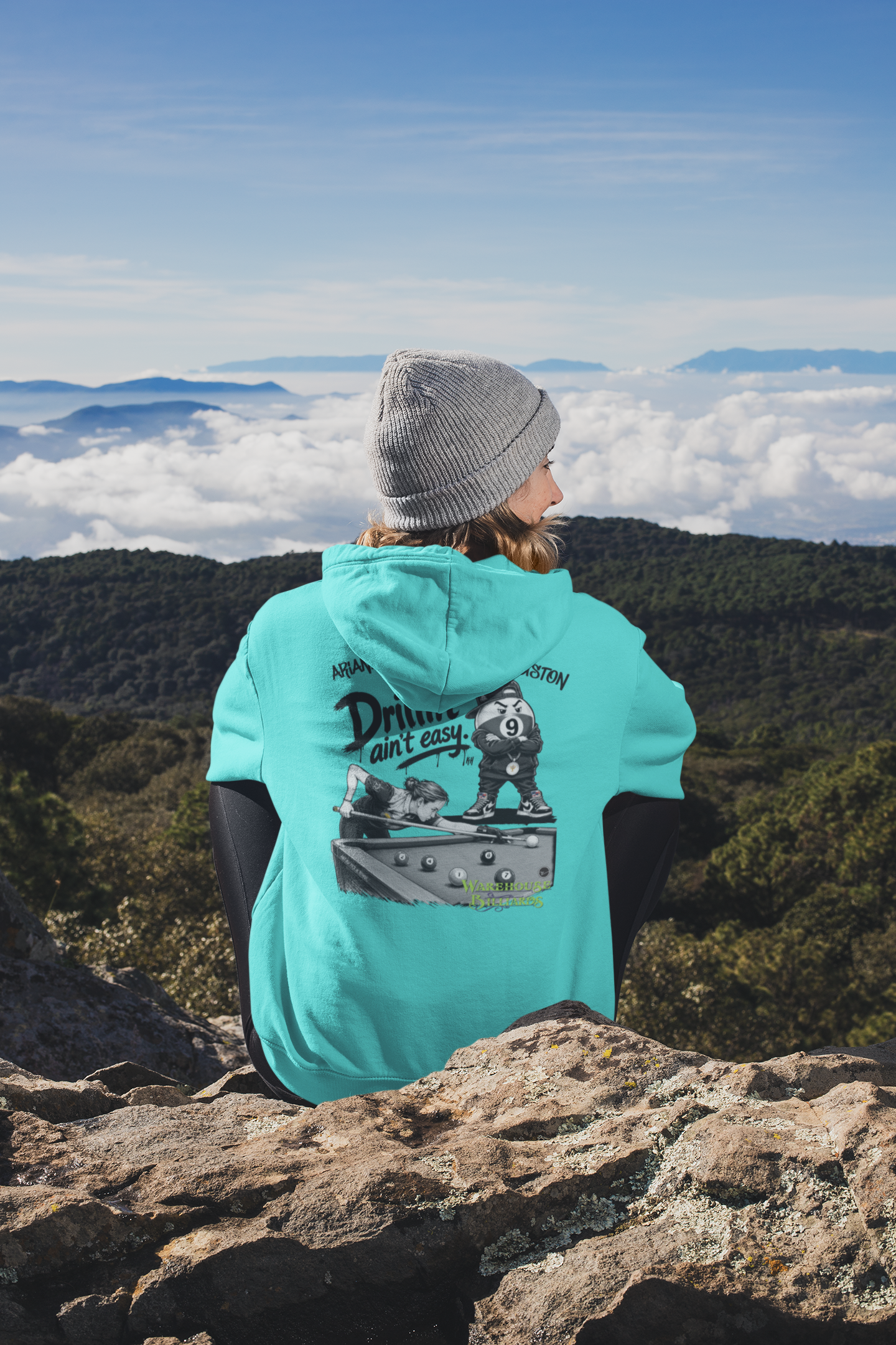 back-view-mockup-of-a-woman-wearing-a-hoodie-while-sitting-in-nature-30491 (1).png