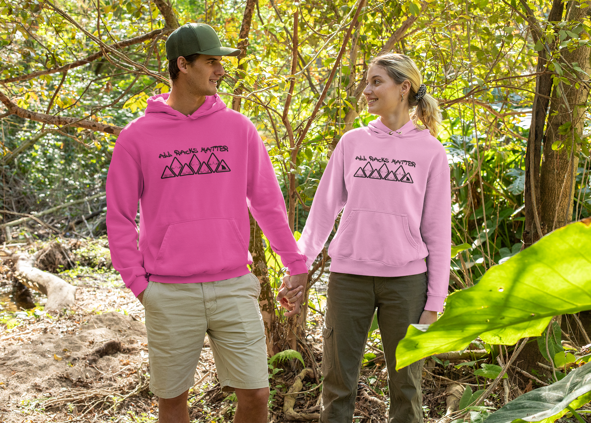 hoodie-mockup-of-a-couple-holding-hands-in-the-woods-32225.png