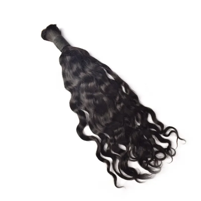 Bundle of black, curly hair extension with weft at the top.