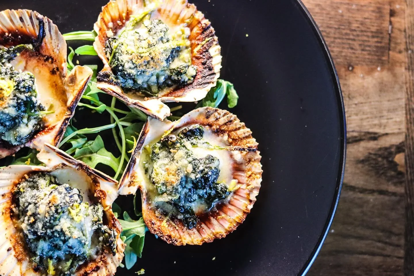 your weekend specials:

scallops rockefeller (gf)
four half shell scallops with a parmesan and spinach crust 

surf &amp; turf (gf)
10+ oz dry aged certified angus ny strip (can substitute for a 8+ oz filet) topped with bacon wrapped shrimp | served 