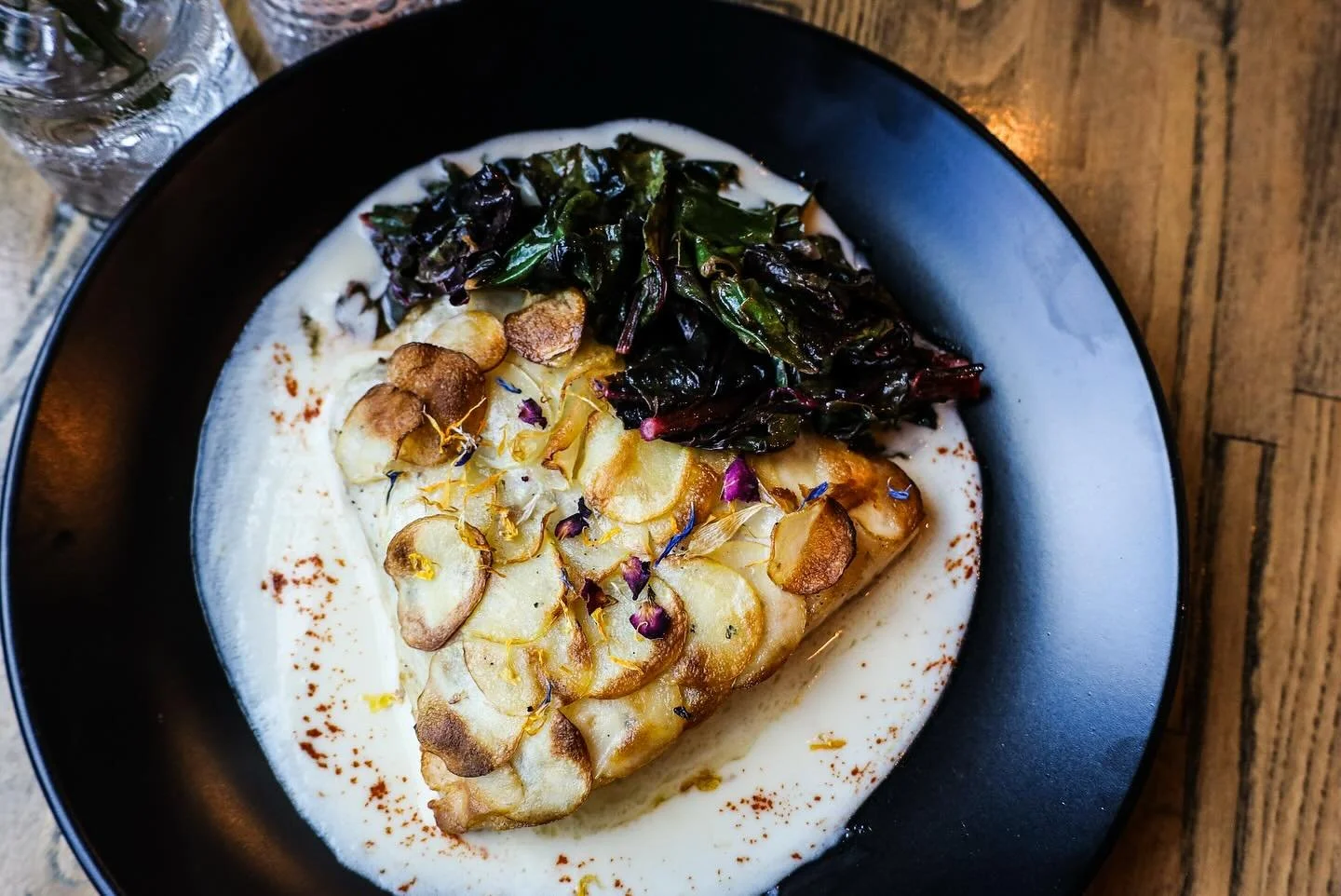 our anniversary specials! available until monday! 

baja sea bass 
(GF)
sea bass filet with crispy potato crust, served with sauteed swiss chard and a lemon curd butter sauce 

arancini frutti di mare
(GF)
italian crispy rice balls with lobster, cala
