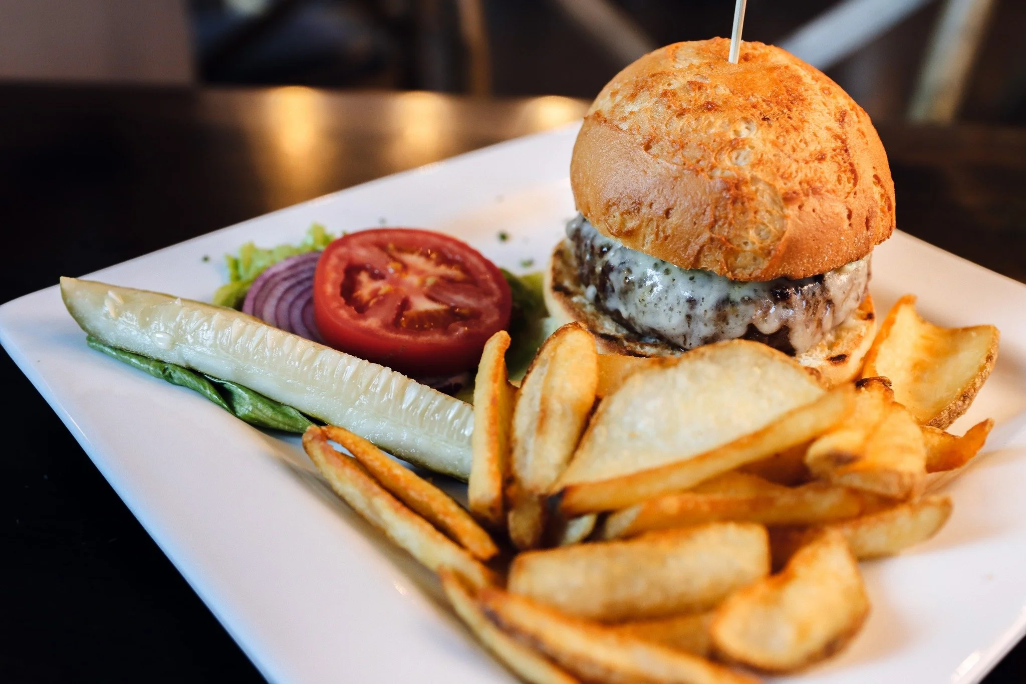 you asked, we listened. now offering, the piripi steak burger 🍔 
this gluten free burger is offered only during lunch and is a 6oz ground tenderloin with gruyere cheese, chimichurri aioli, tomato, lettuce, and onion; with choice of house side salad 