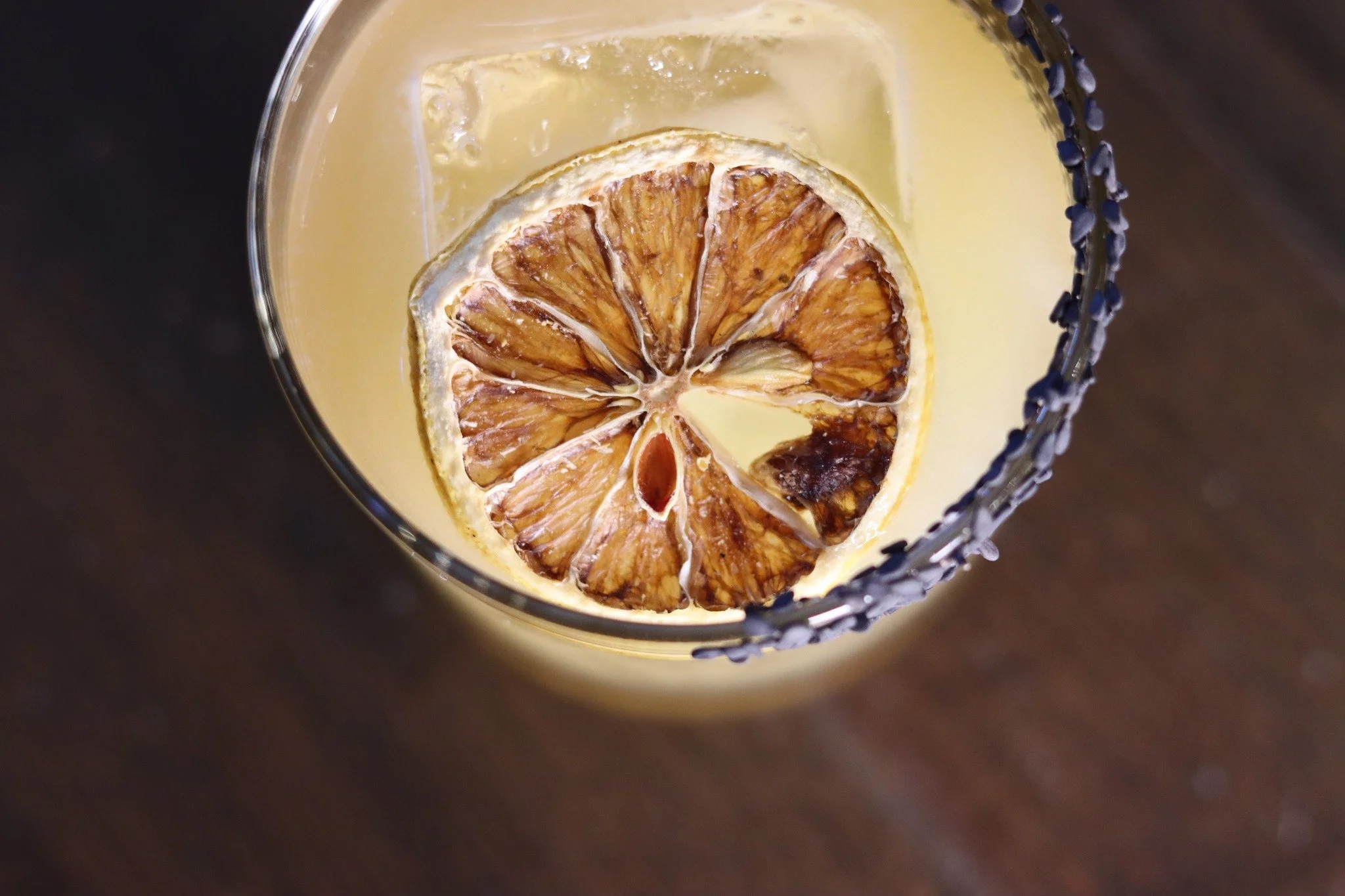 The Golden Buff 
N/A Cocktail: Black &amp; Gold
Made with bourbon, frangelico, honey, lemon, &amp; a dash of sesame oil 🥃