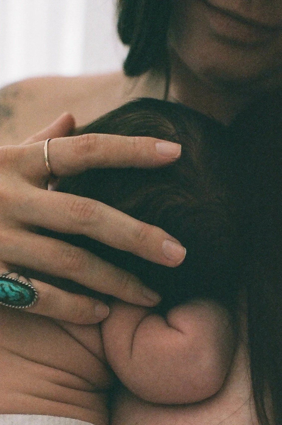 a new mom holding her baby