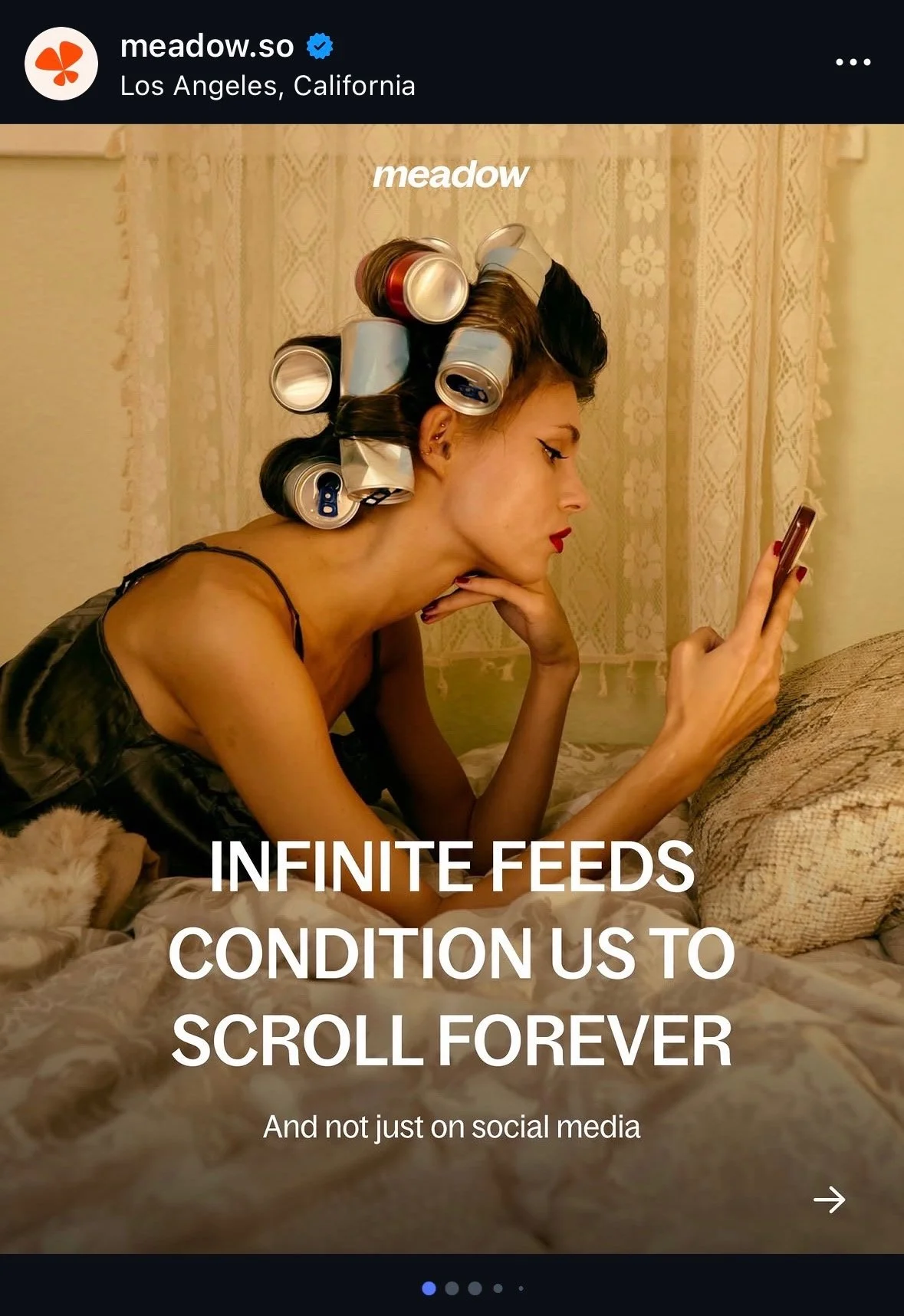 A woman lying on a bed with hair rollers, looking at her phone. Text on image reads: 'INFINITE FEEDS CONDITION US TO SCROLL FOREVER. And not just on social media.'