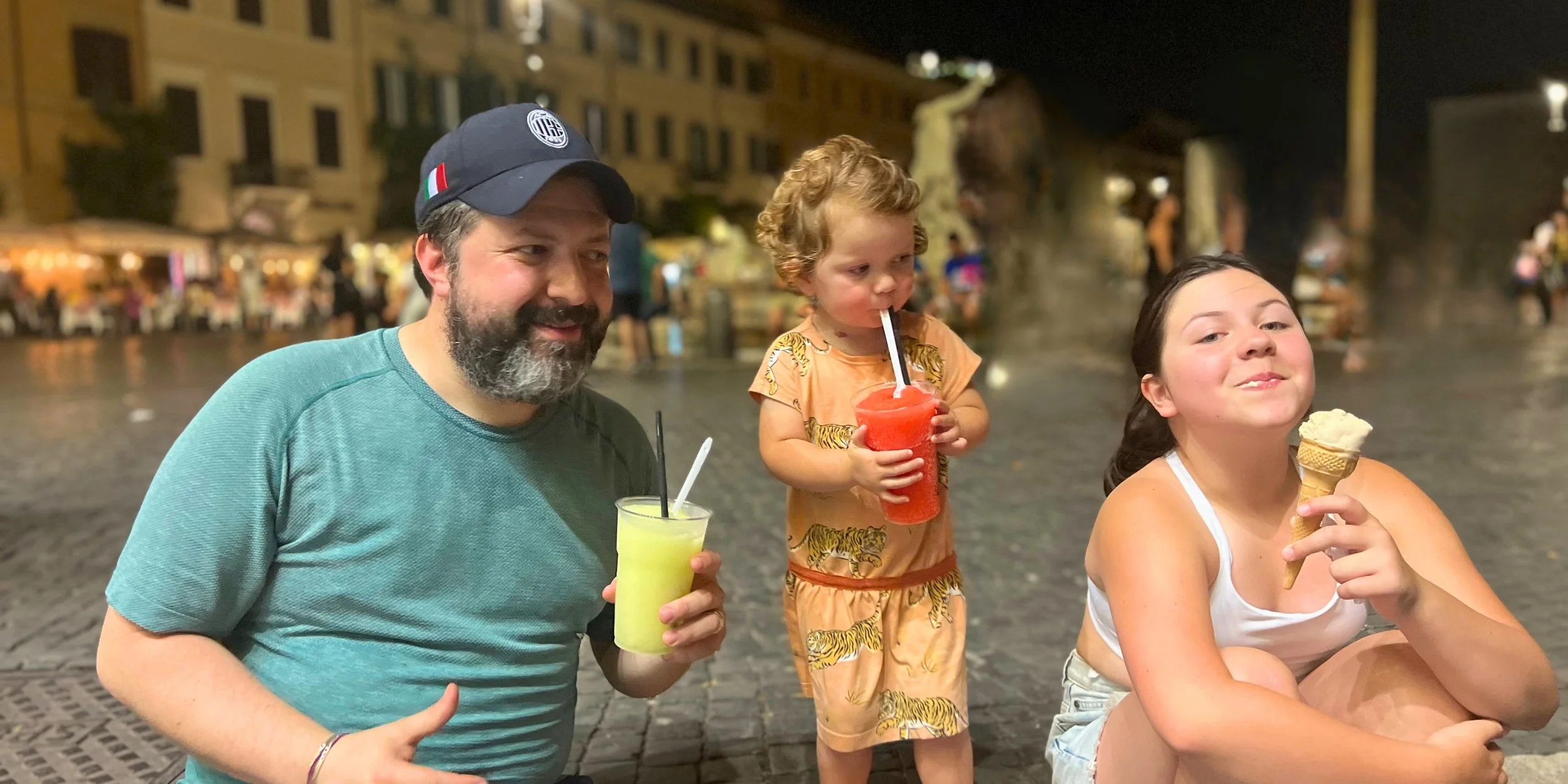 Our family enjoying ice drinks in Rome Italy