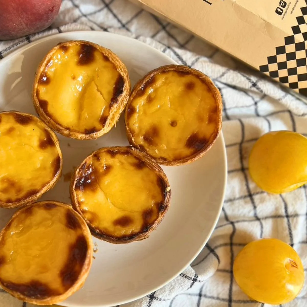 Custard tarts on a plate in Lisbon Portugal