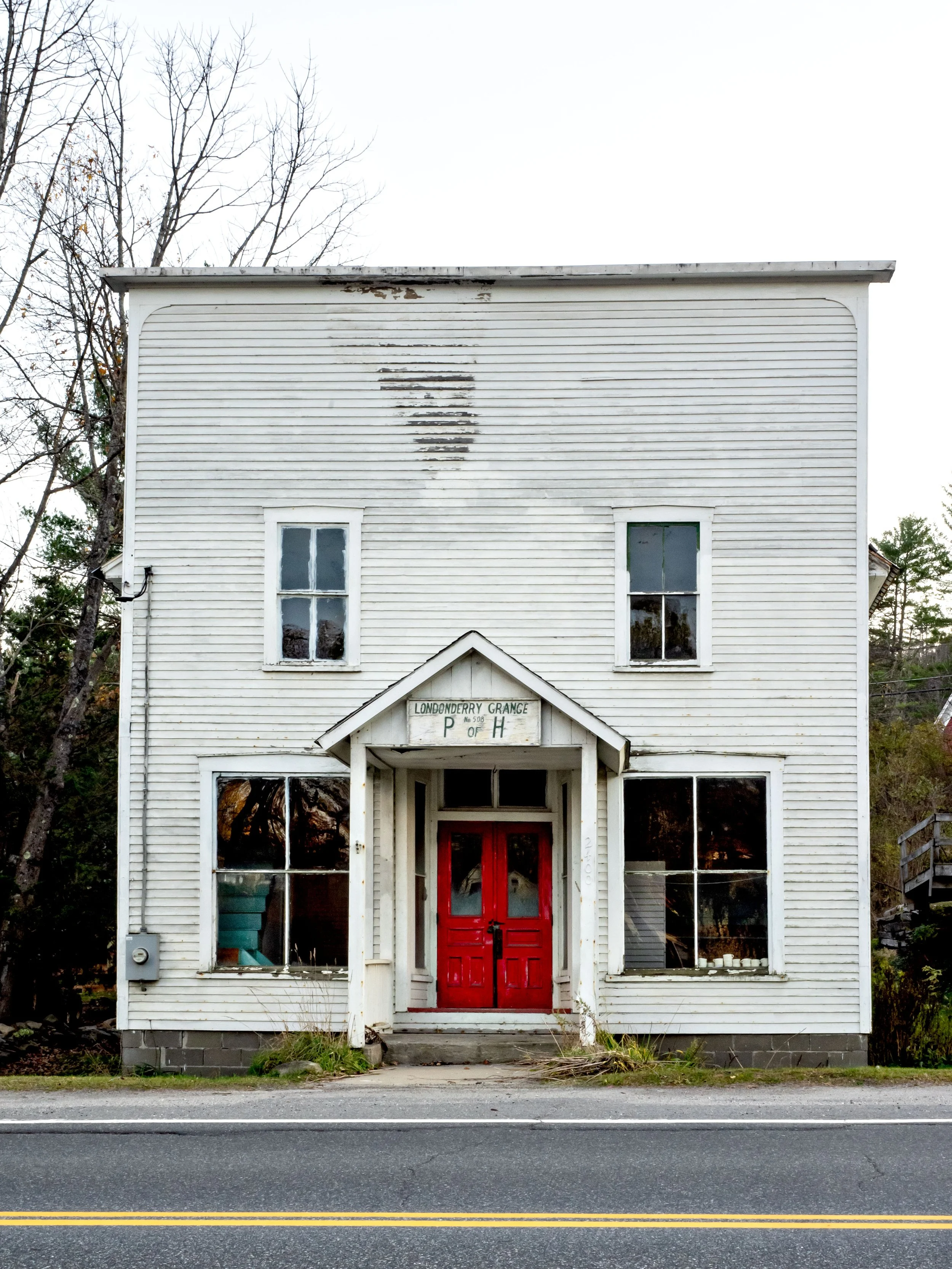 Vermont • Londonderry • Grange building with red door • Oct 2020