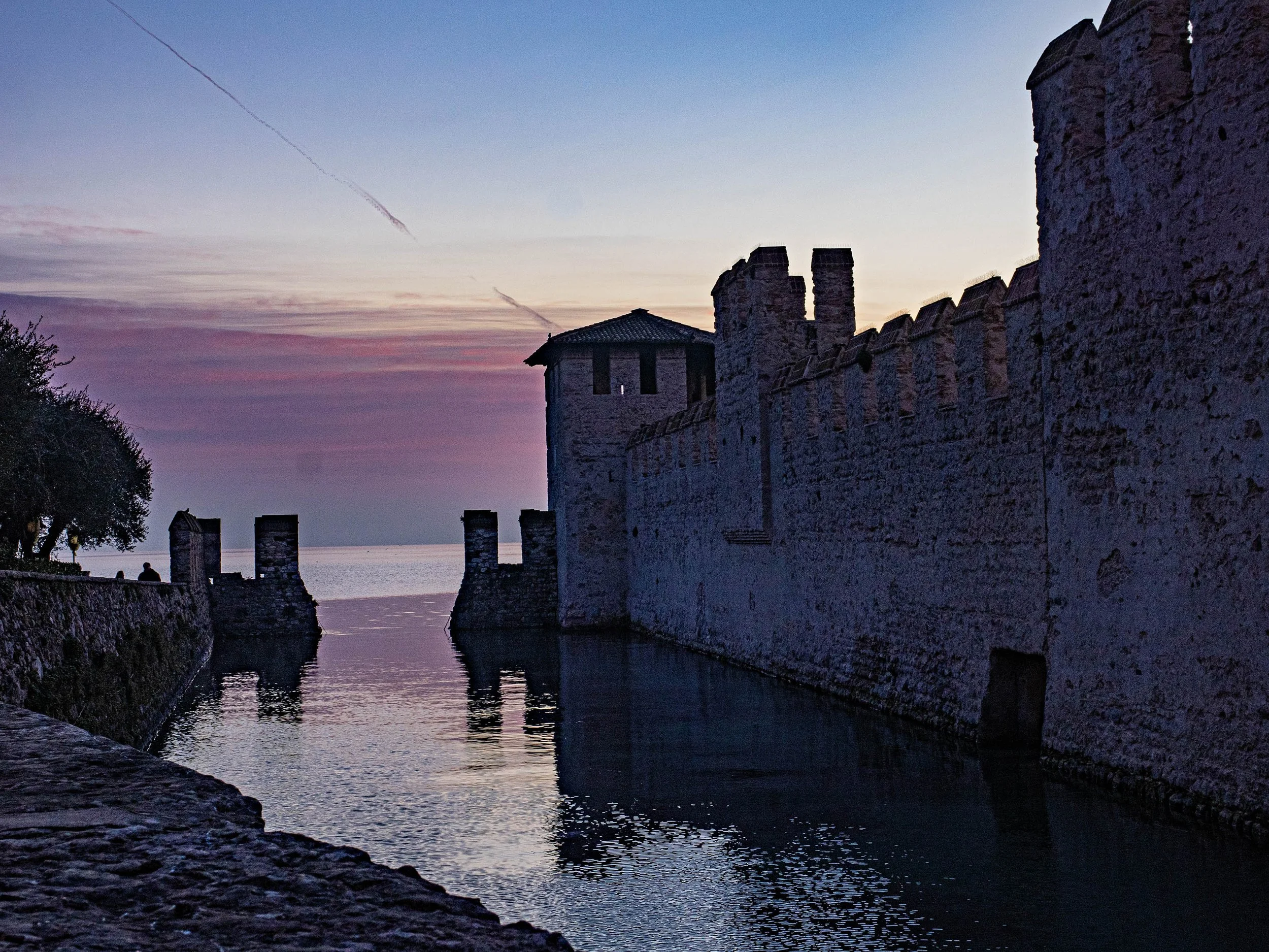 Italy • Sirmione, Lake Garda • Scaligero Castle • Castle in purple at dawn • Feb 2, 2024