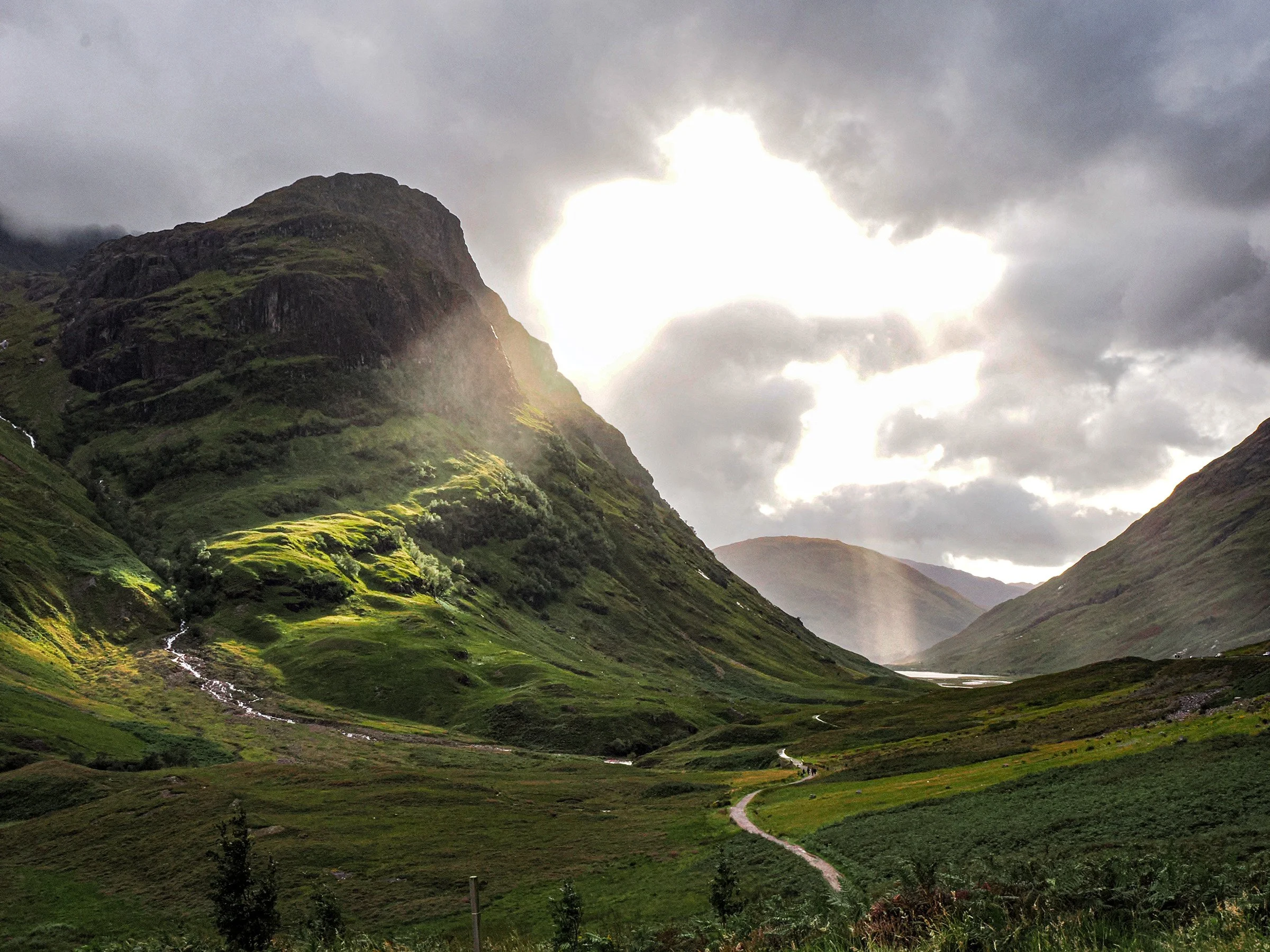 Scotland • Glencoe • Mountains bathed in sunlight over the loch • Aug 9, 2025