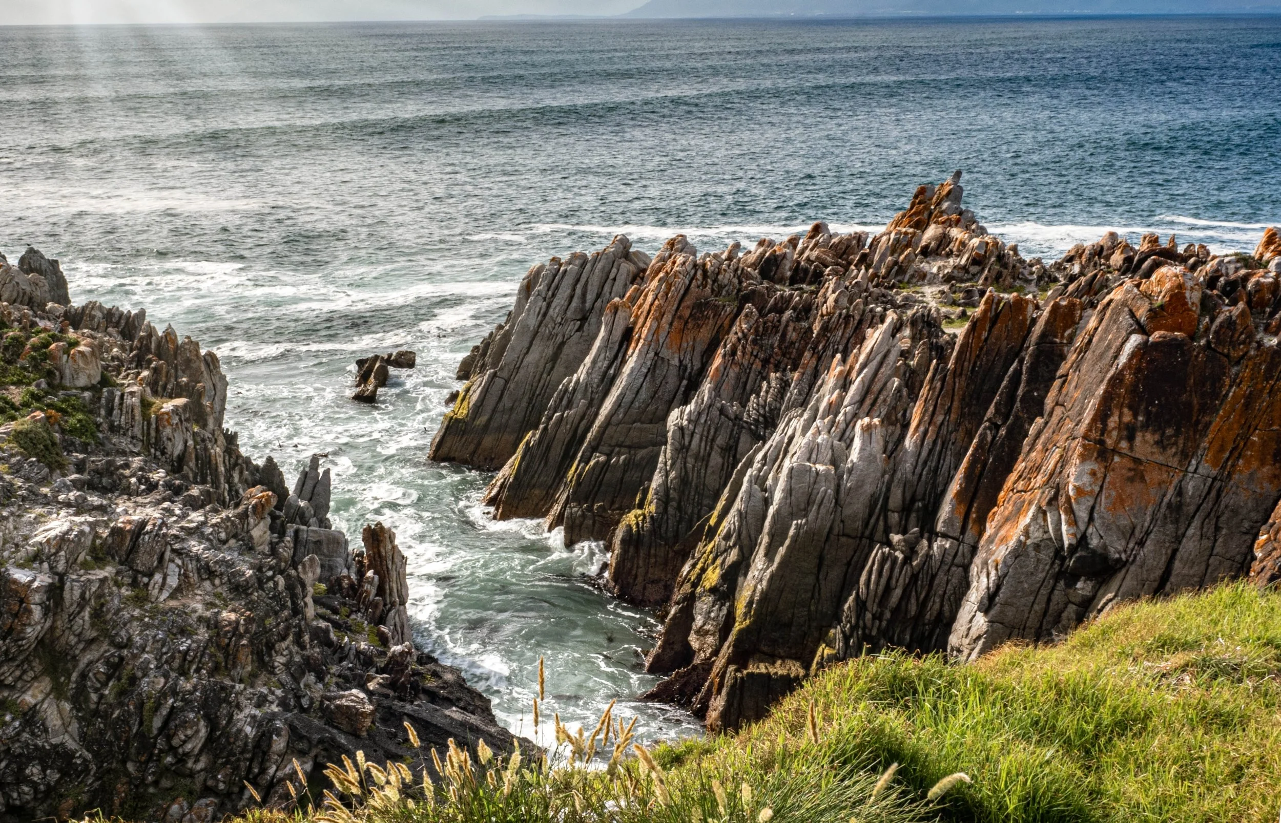 South Africa • De Kelders • Jagged rock formation cliffs • Dec 9, 2024