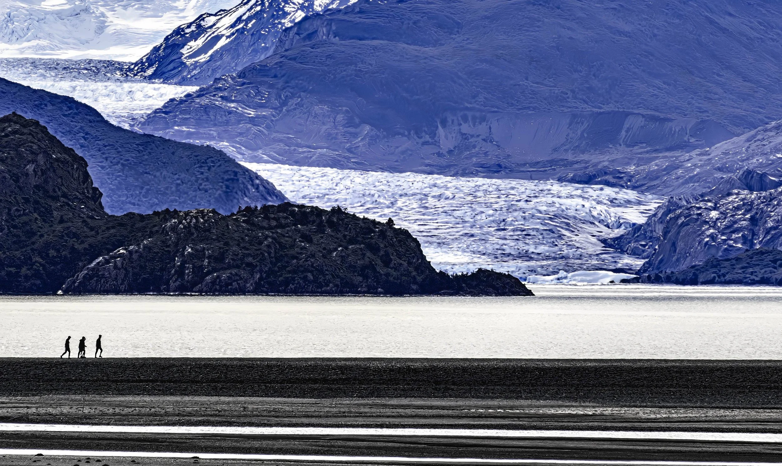 Chile • Torres del Paine • Lago Grey • People walking with Grey Glacier behind III • Mar 24, 2024
