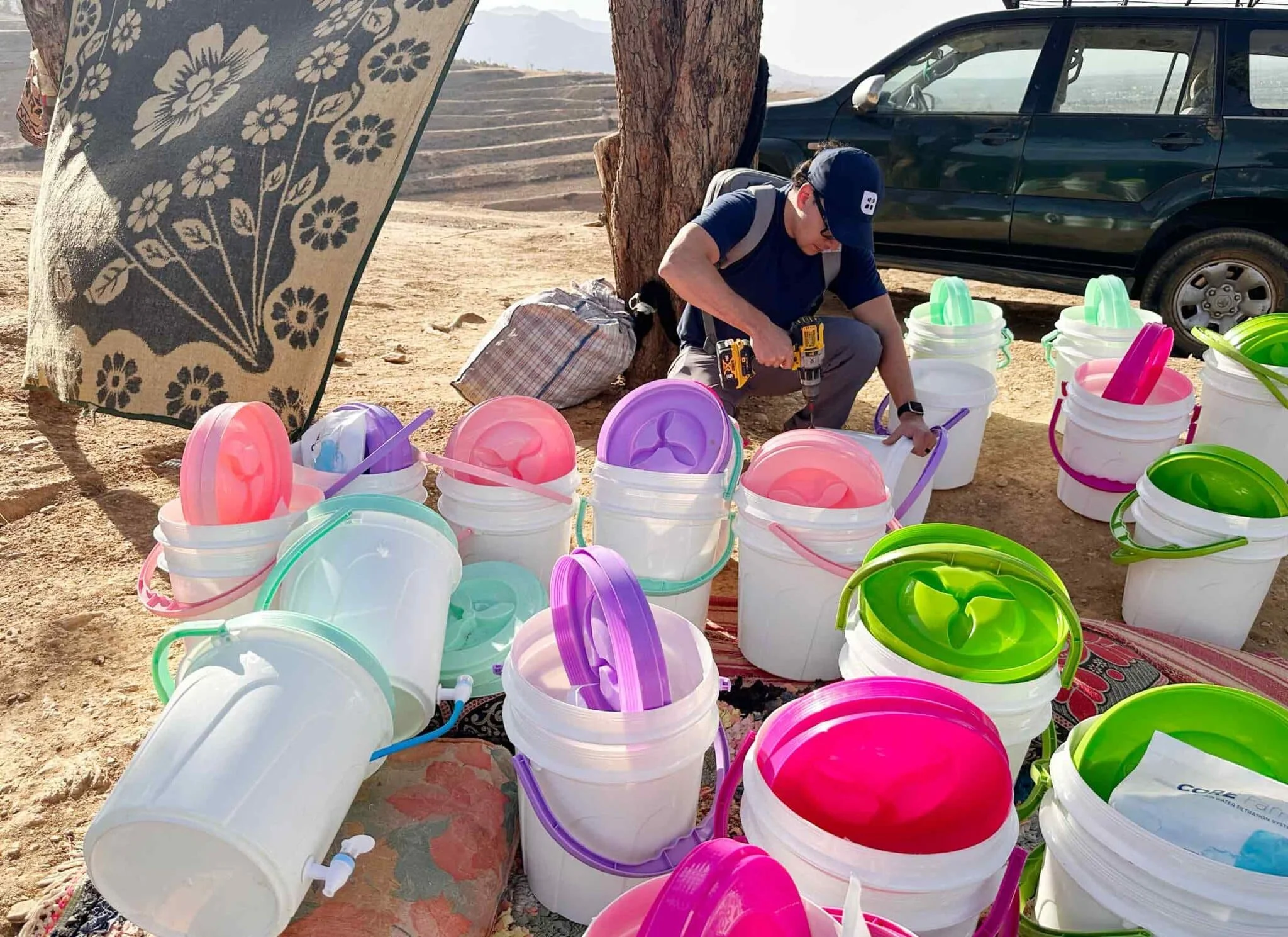   Water filtration systems are prepared for distribution to families affected by the earthquake in Morocco.  