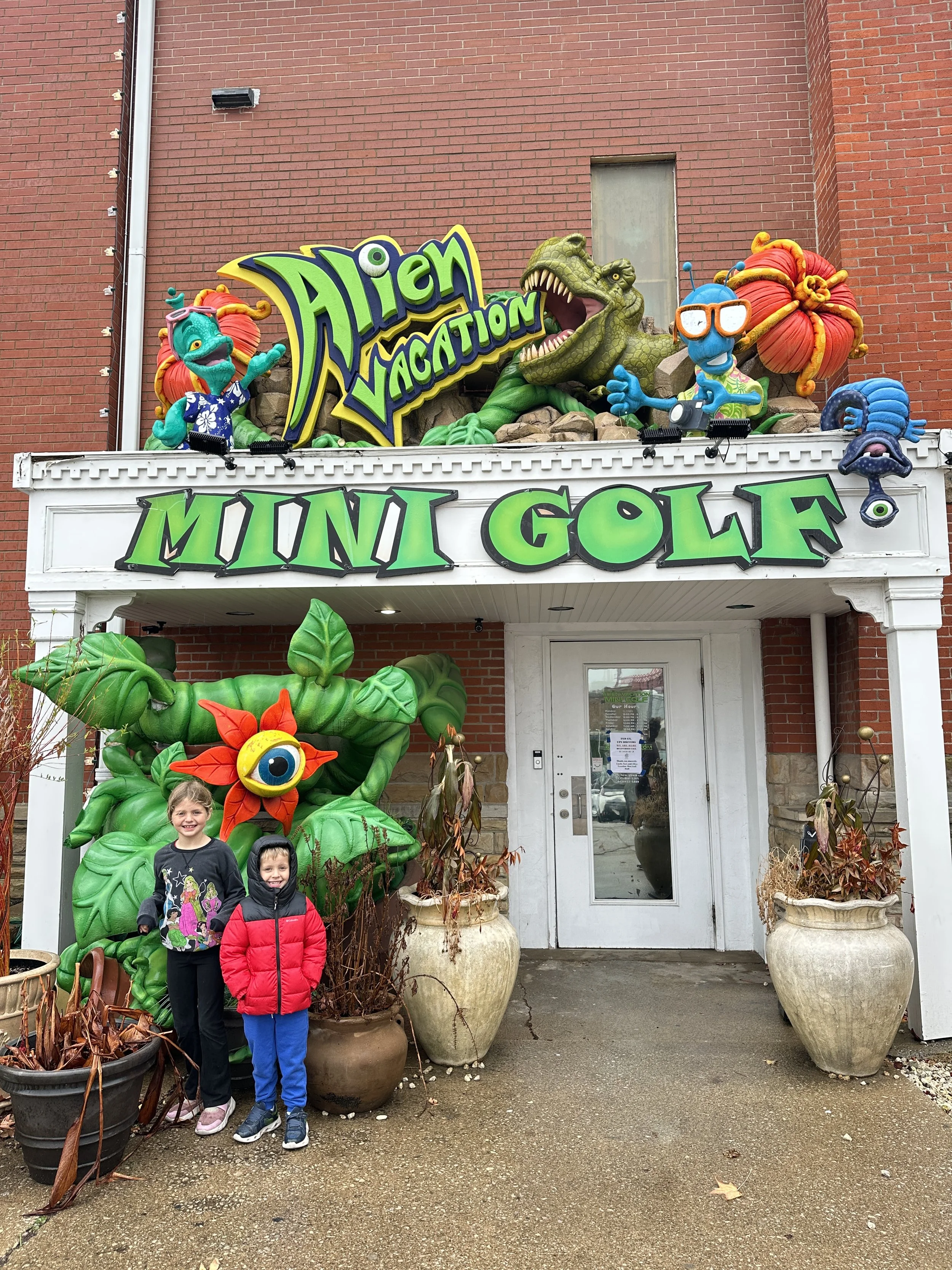 Ava and Nolan at Alien Vacation Mini Golf