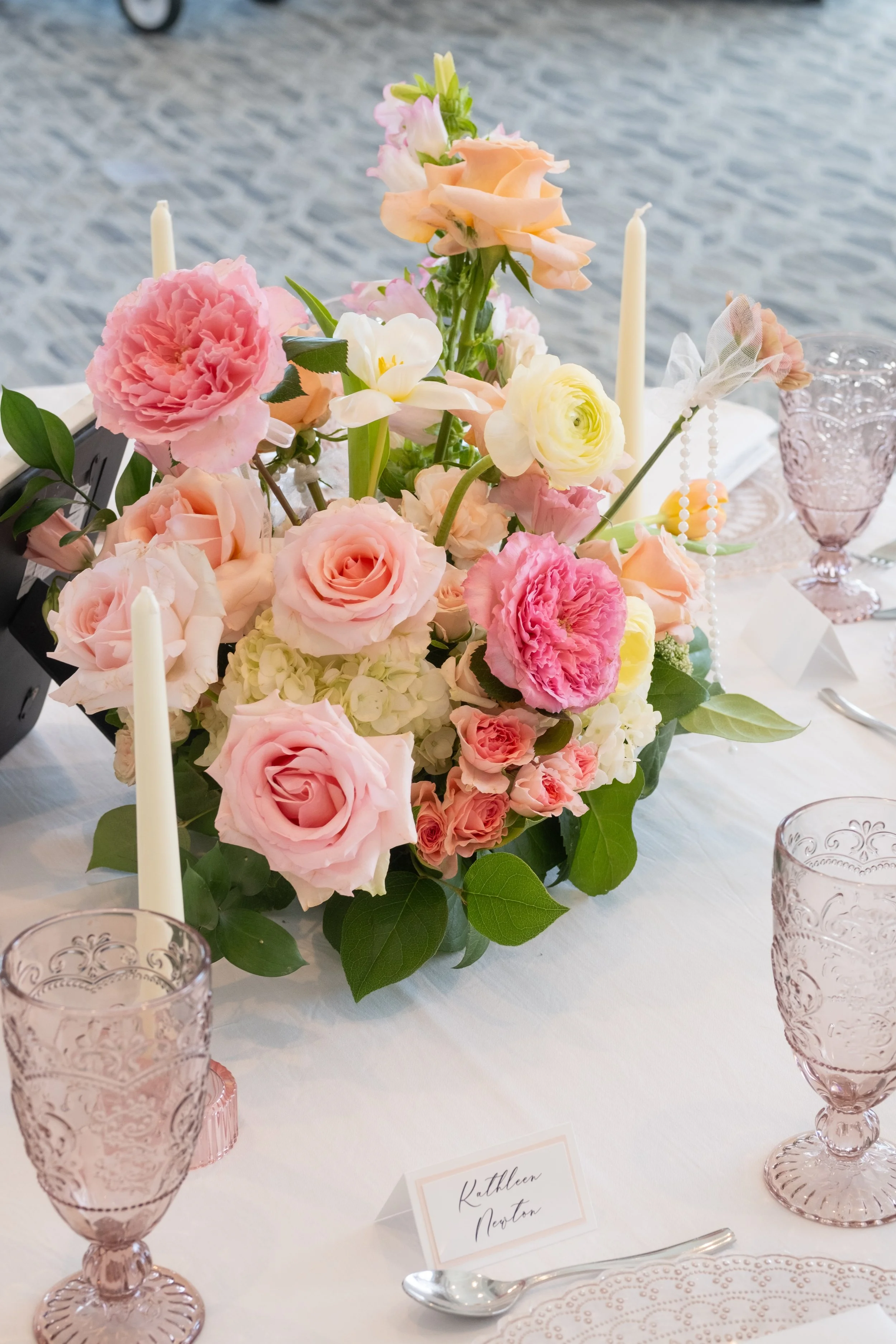 pink ribbon themed, loveshackfancy themed, birthday party, bridal shower, pink party, ribbon flower arch, pink table setting ideas