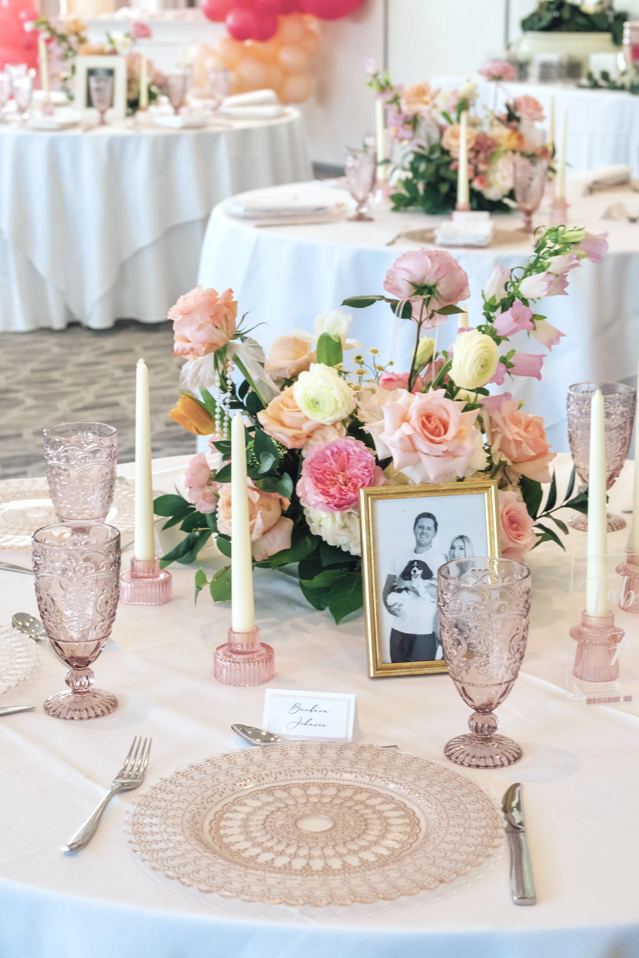 pink ribbon themed, loveshackfancy themed, birthday party, bridal shower, pink party, ribbon flower arch, pink table setting ideas
