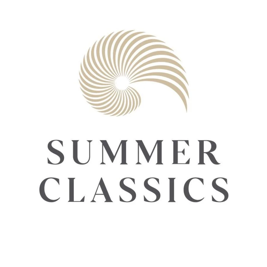 A logo for Summer Classics featuring a beige spiral shell graphic above the text 'SUMMER CLASSICS' in gray, uppercase serif font.