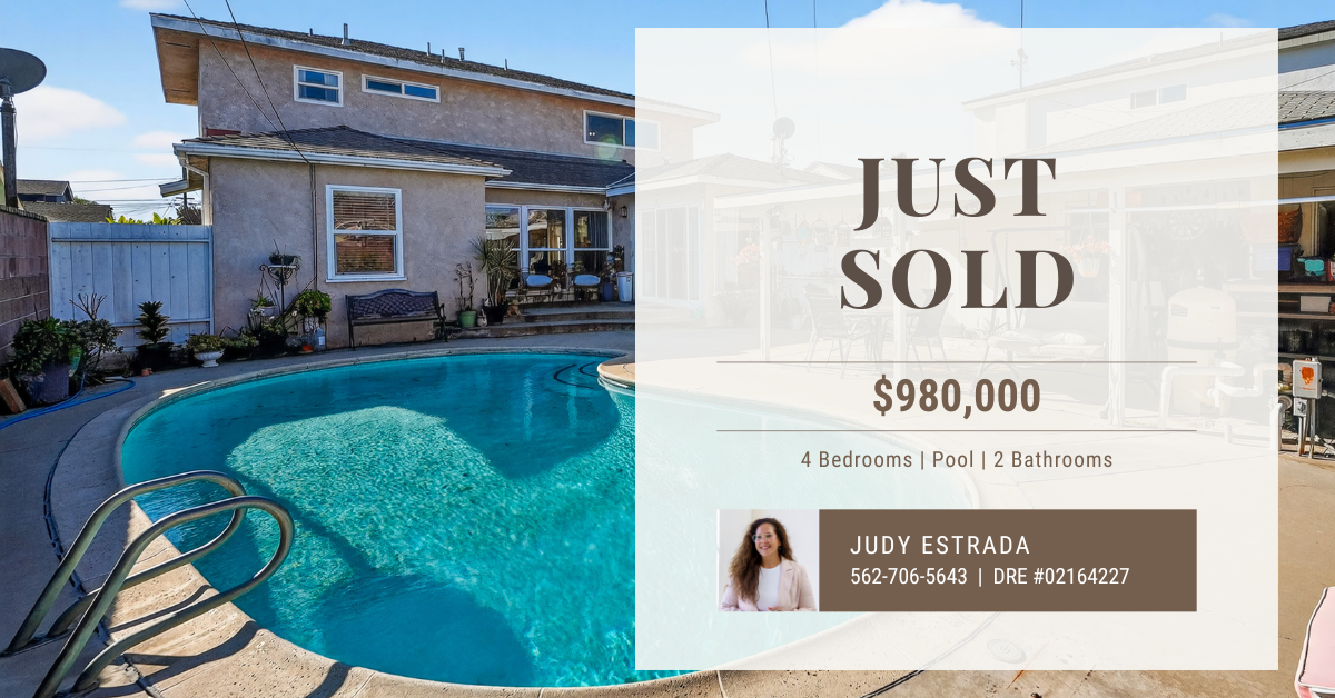 A spacious backyard of a Lakewood, CA pool home for sale, featuring a large swimming pool with a two-story family home in the background. An example of a successful home sale in the Long Beach and Lakewood real estate market by a local realtor.