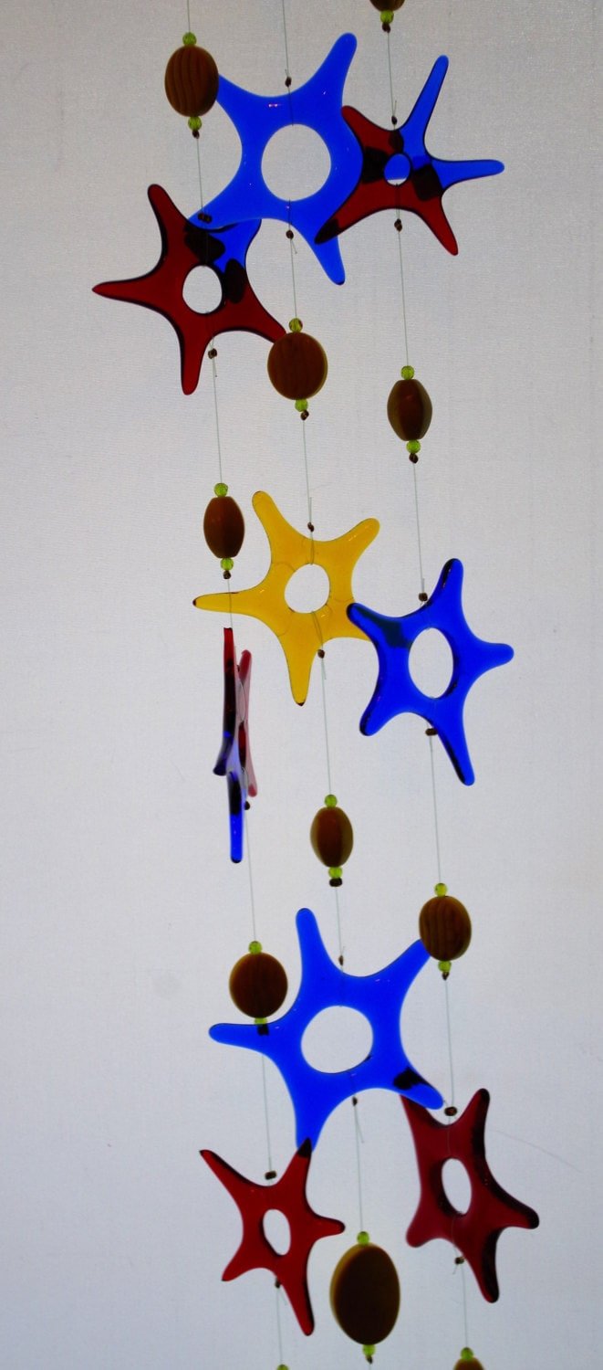 patriotic stars and stripes wind chimes in red, gold and blue.