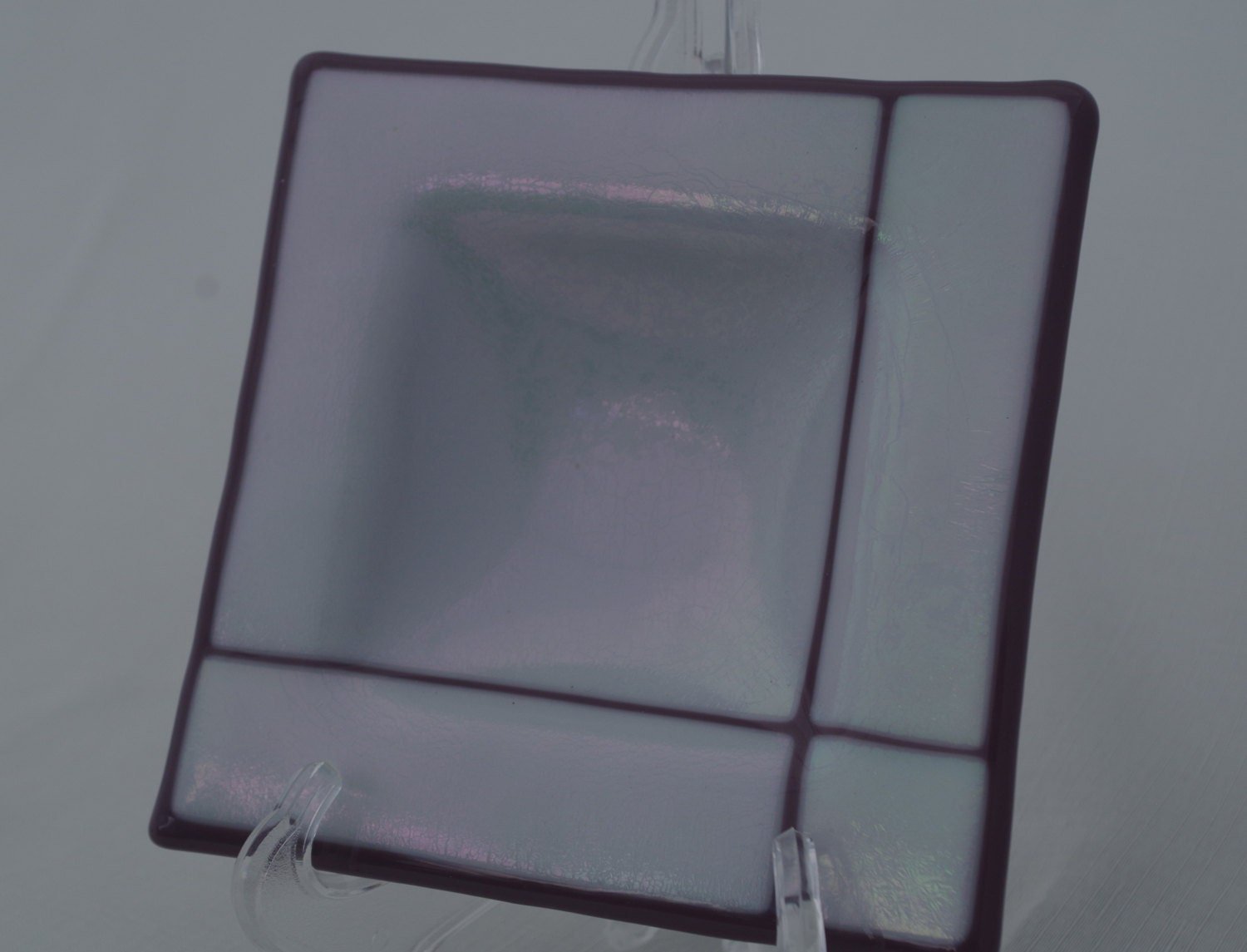 Beautiful  square bowl fused in lilac and iridescent art glass.