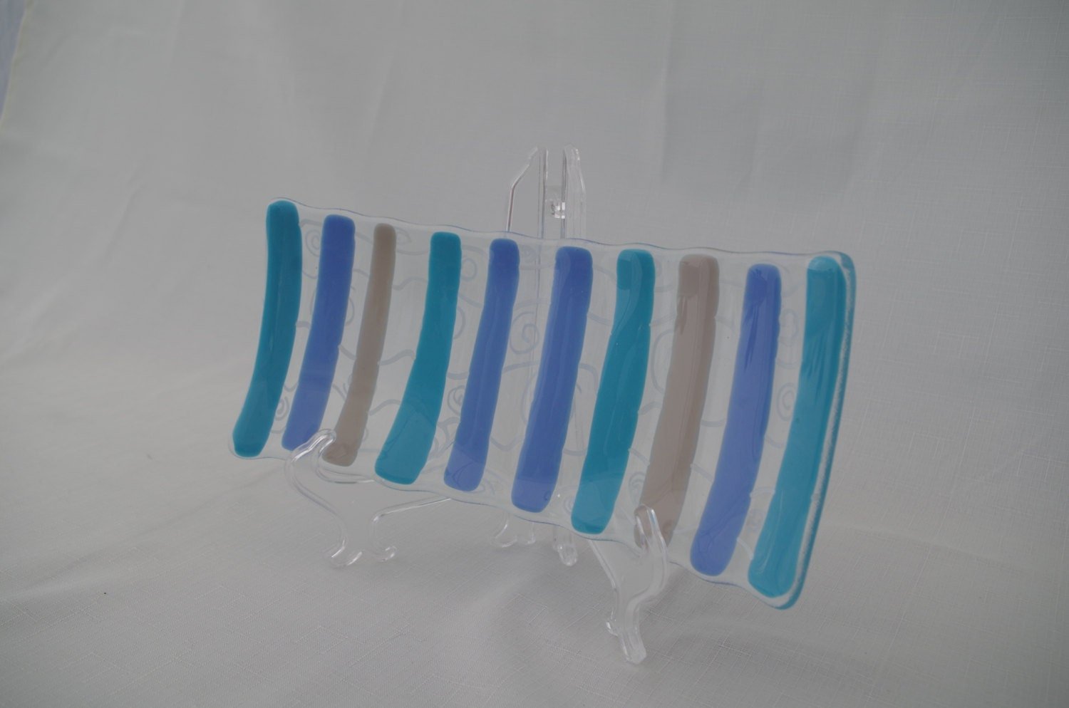 Fused sushi platter in clear and blue art glass.