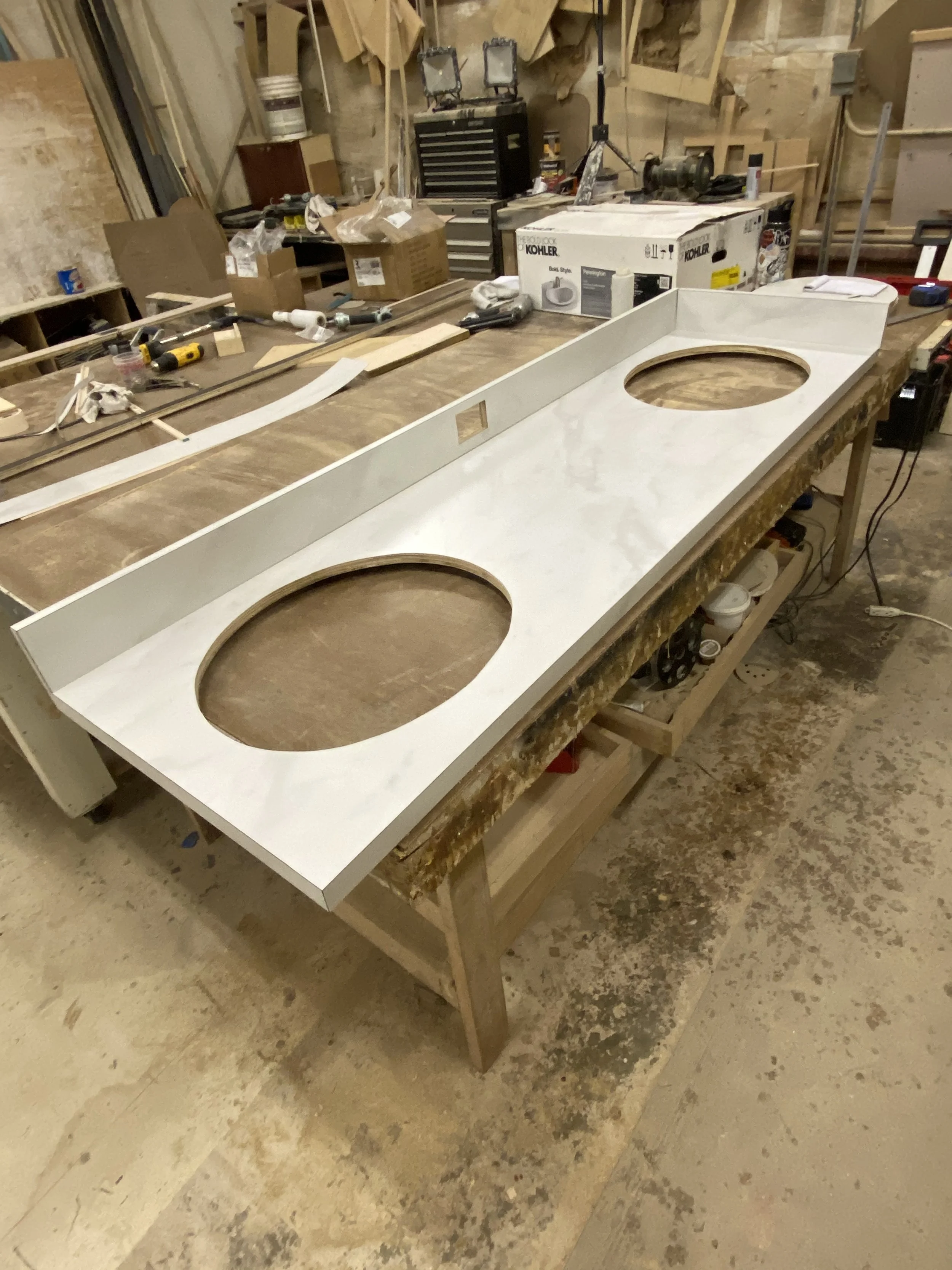 Countertop with sink and outlet cutouts