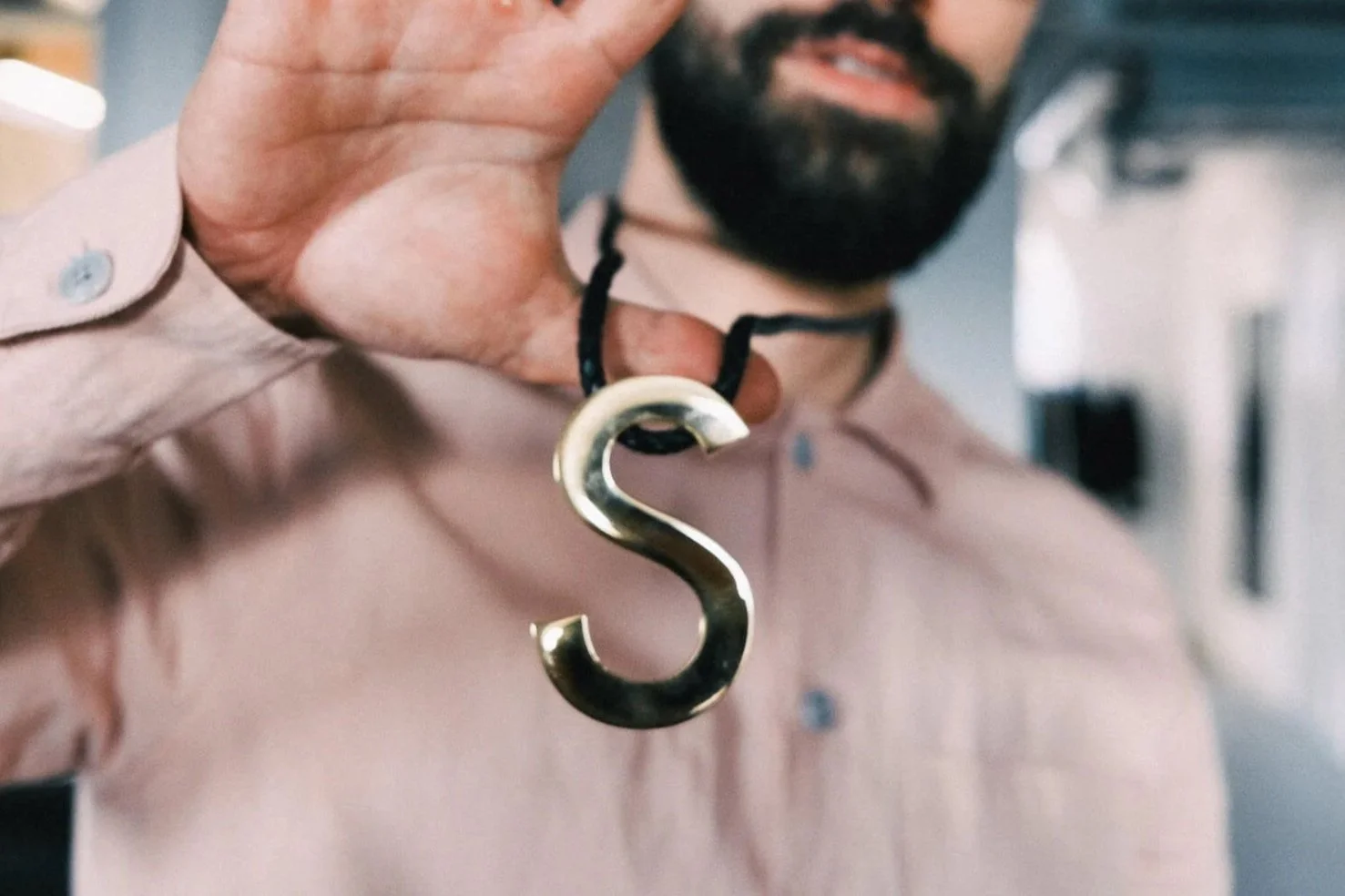 Michel Adamek with the Design S Award around his neck