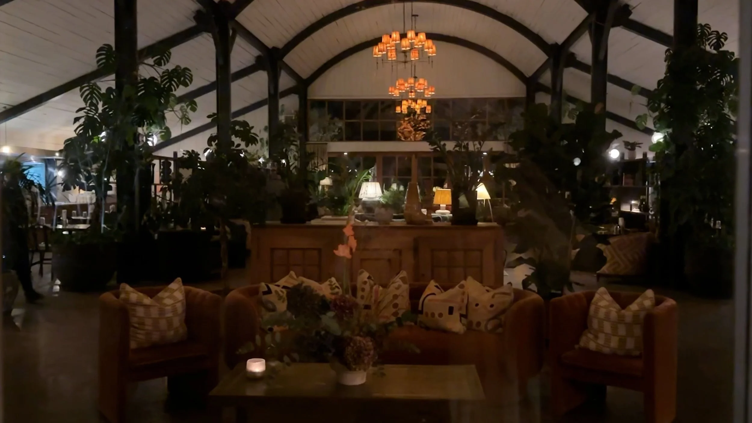 Dimly lit dining seating in the Sohohouse
